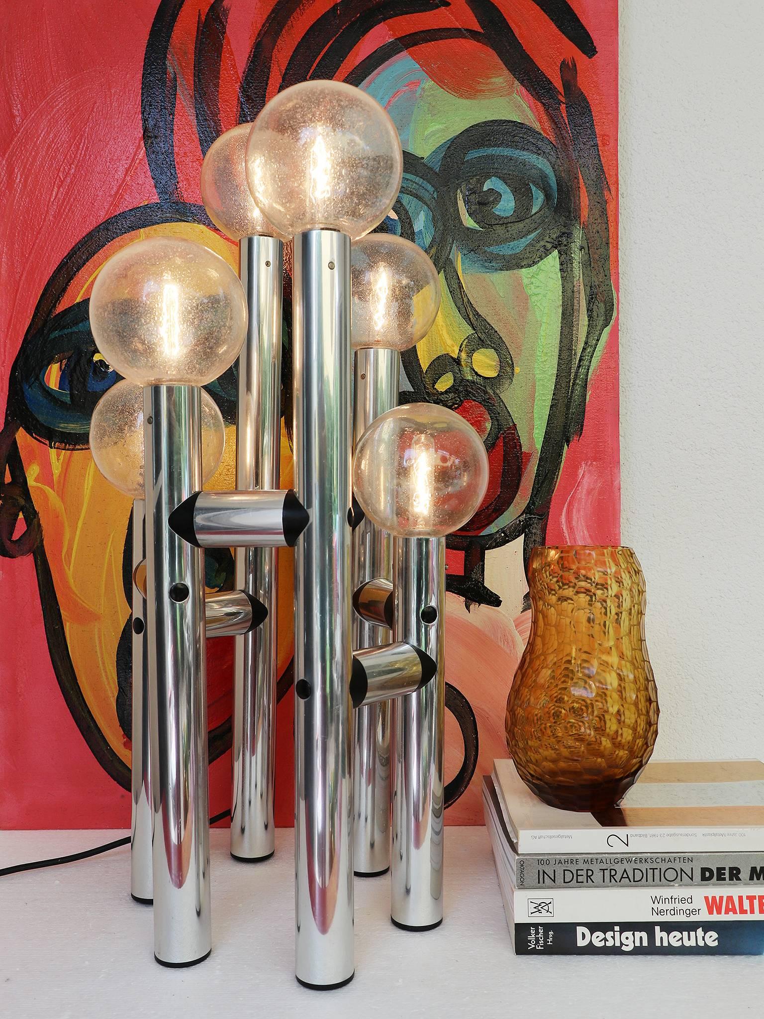 Atomium tower table or floor light mod. RS6-TL 1972 designed by J.T. Kalmar, Austria in 1972. The frame is made of polished aluminum, the original globes are made of blown glass. 

Lighting: takes six small Edisob E14 base screw bulbs. 
Condition: