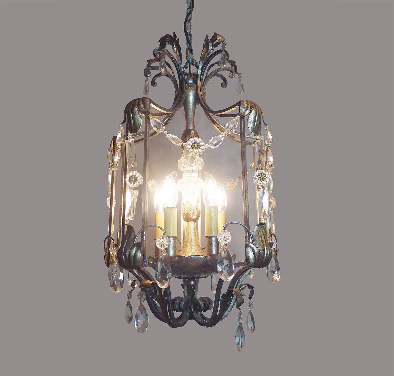 Elegant Florentine crystal and wrought iron leaf chandelier by BF Art, Italy. 

Measures: dm 15.75“ (40 cm), height 26“ (66 cm), height incl. chain and canopy 59“ (150 cm). 
Lighting: takes five small Edison E14 base screw bulbs. 
Condition: very