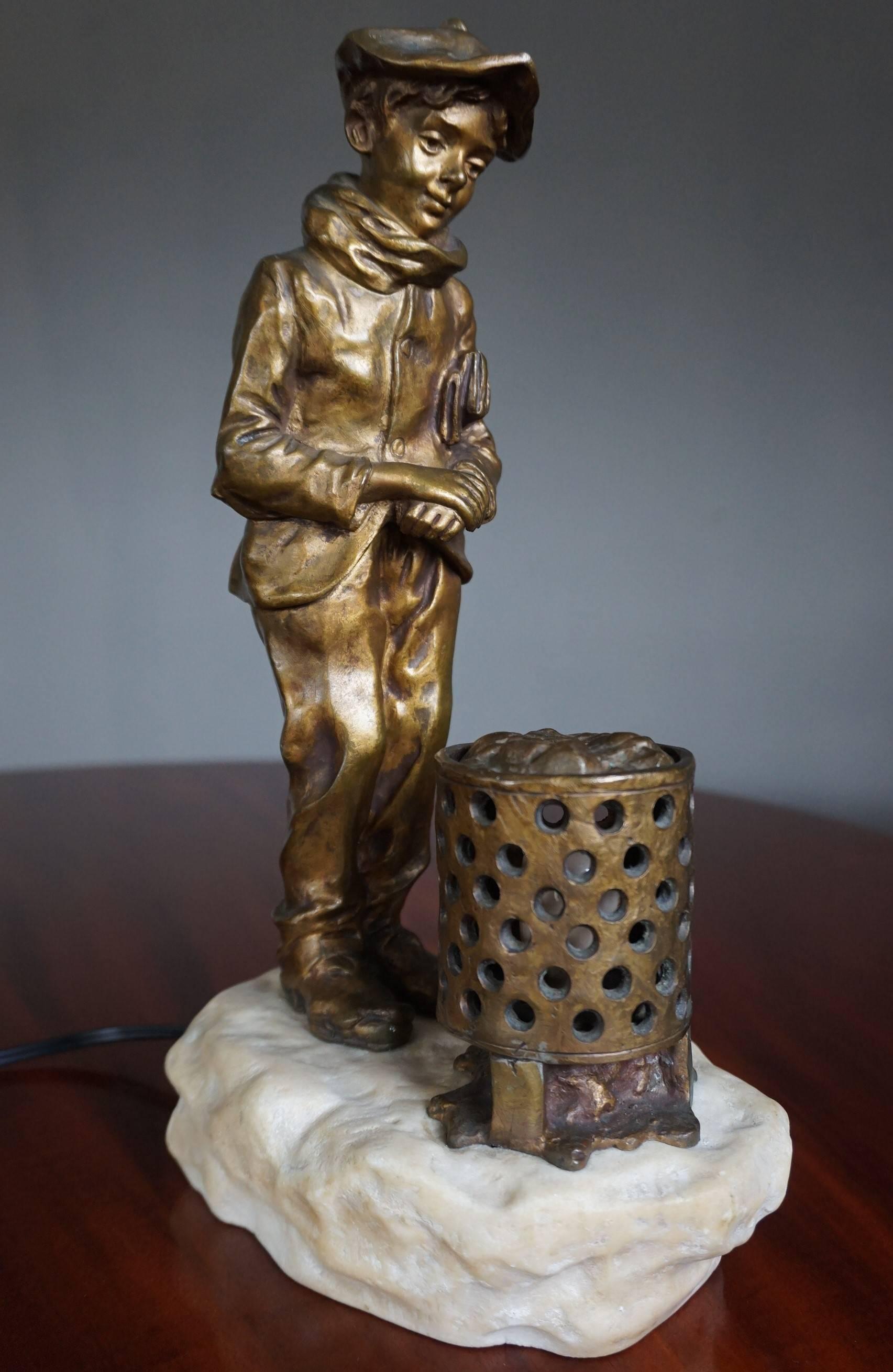Rare José Cardona (1878-1923) and Ferdinand Levillain (1837-1905) sculptural table lamp.

This antique table or desk lamp embodies everything we love about art and antiques. The beautiful and realistic boy sculpture is a true work of art and for the