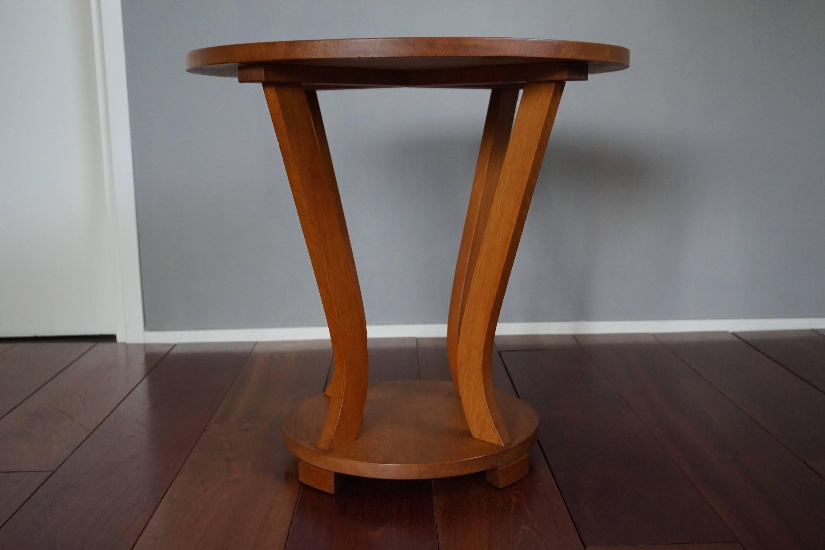 Beautiful design and excellent condition Art Deco table.

For us to find this beautifully symmetrical Art Deco table in this excellent and unrestored condition, again, felt like a blessing. The unusual, circular base and top with the avantgardistic