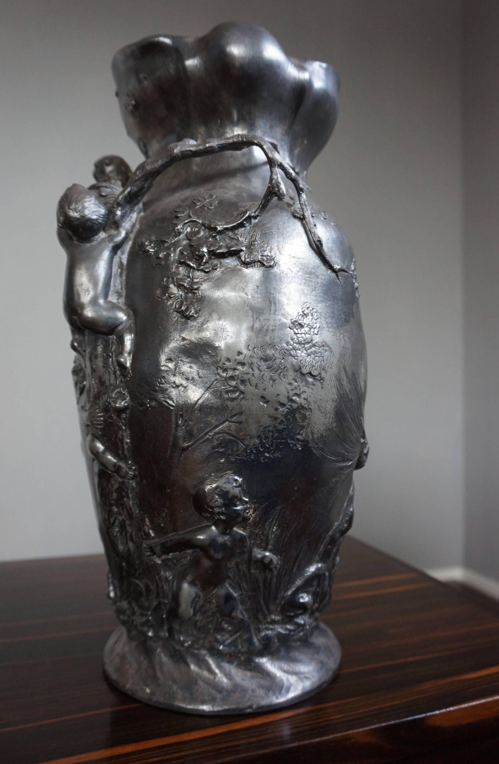 Renaissance Revival Amazing Workmanship Antique Pewter Vase Cherubs Exploring and Hunting Nature