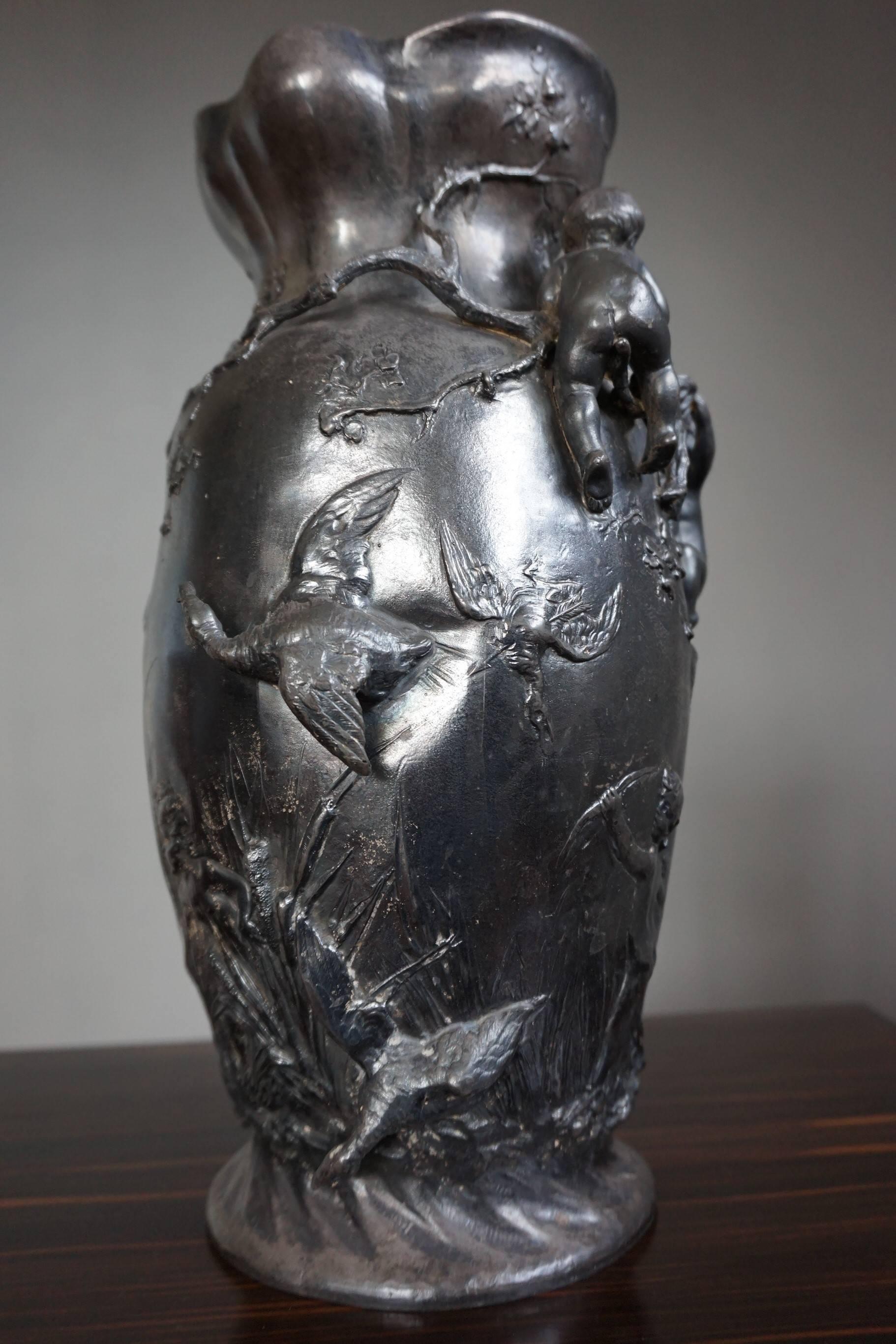 antiqued pewter vase