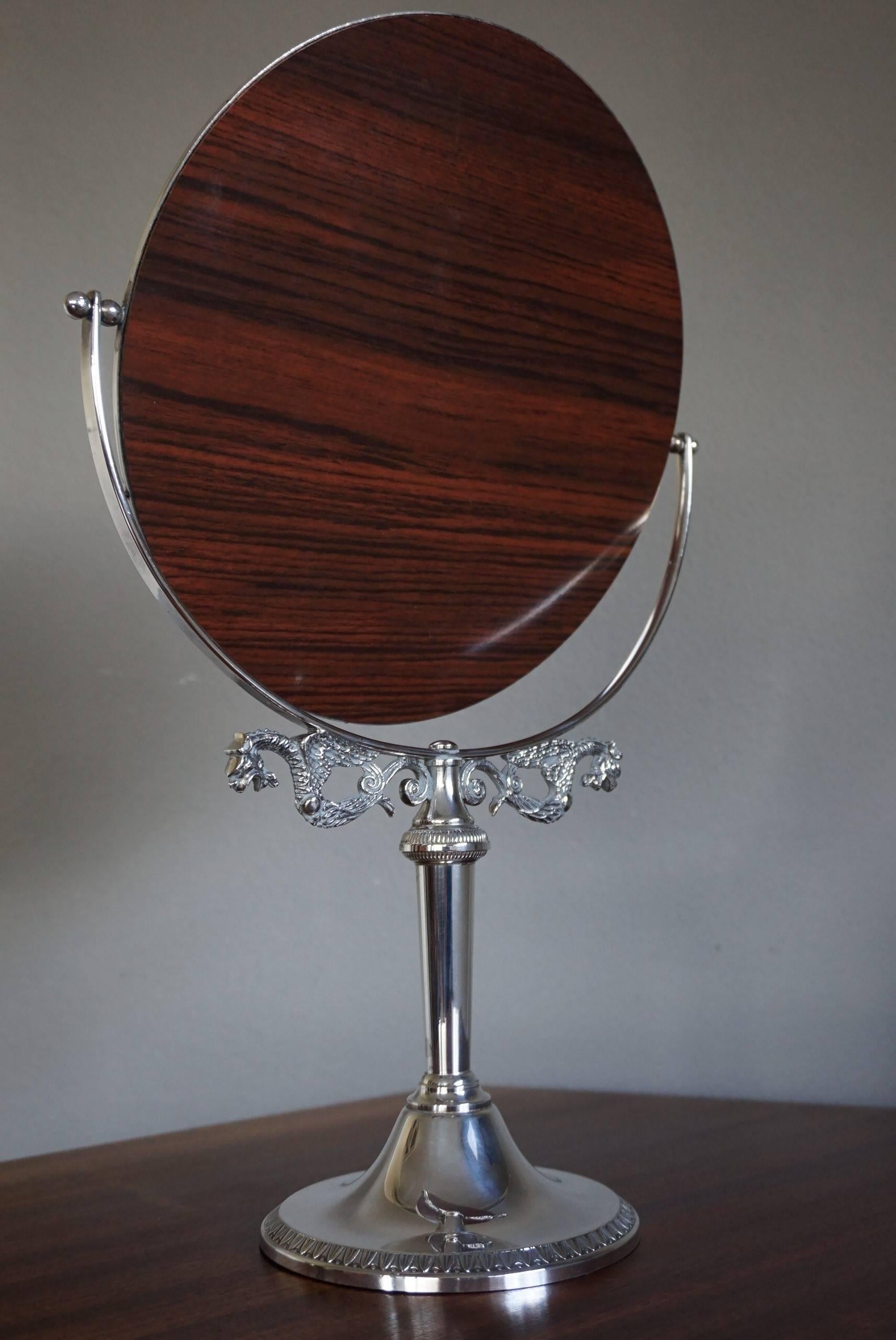 Rare, good looking and practical table mirror.

From a local silver and jewelry dealer who is retiring we acquired this wonderful and highly practical table mirror. Thousands of people have looked into this mirror to see if the jewelry they wanted