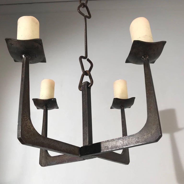 Early 20th Century Arts And Crafts Wrought Iron Candle Lamp Four All Handcrafted Angular Design Candle Pendant Light This Sleek Timeless Chandelier
