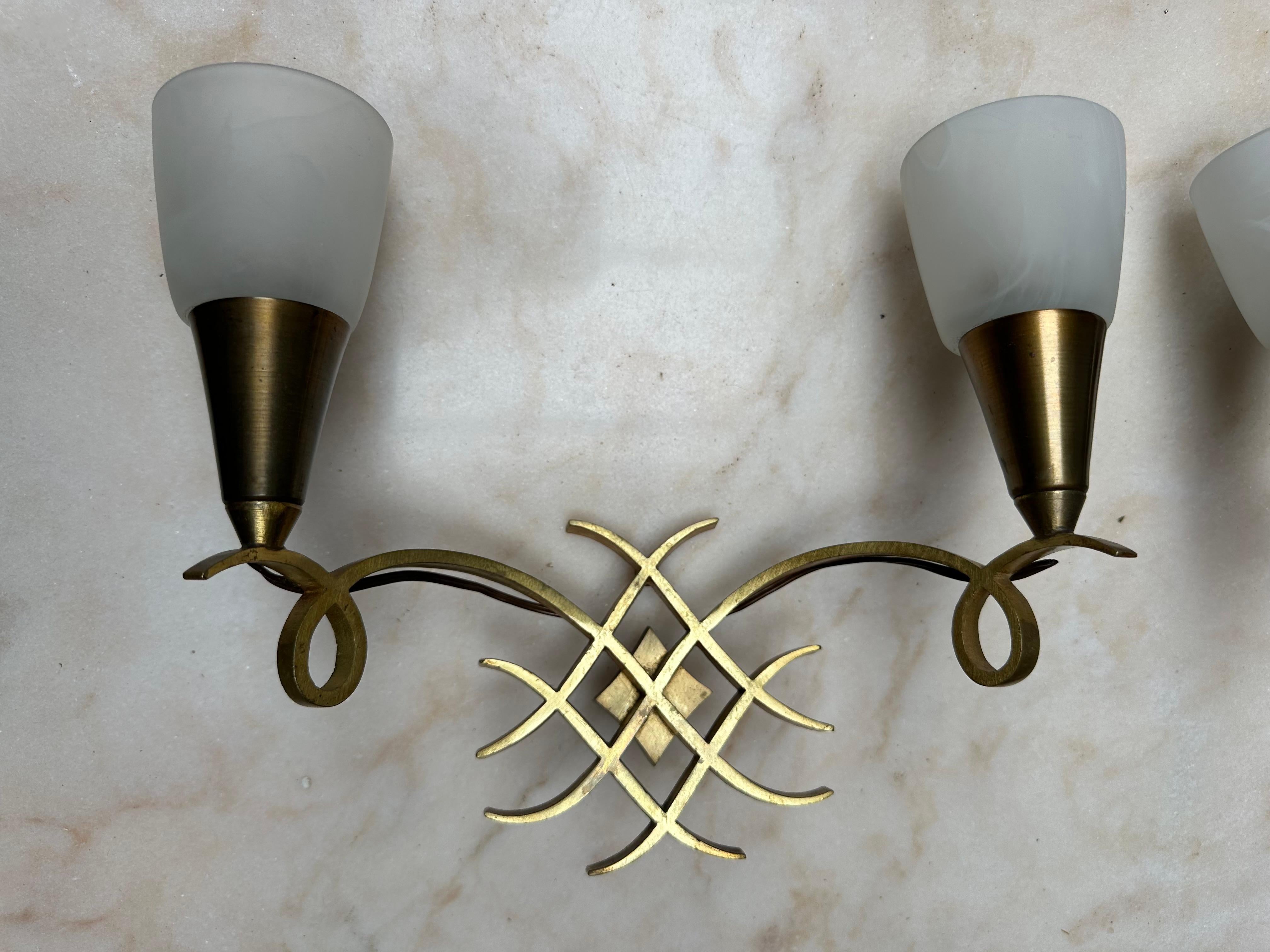 Cast Pair of French Art Deco Bronze Wall Sconces Attributed to Jules Leleu For Sale