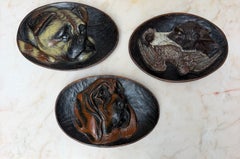 Set of 3 Mid-Century Hand-Carved Polychrome Wood Dog Wall Plaques, circa 1950s