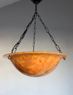 Art Deco Style Alabaster Pendant Light with Amber Glow and Dramatic Natural Vein