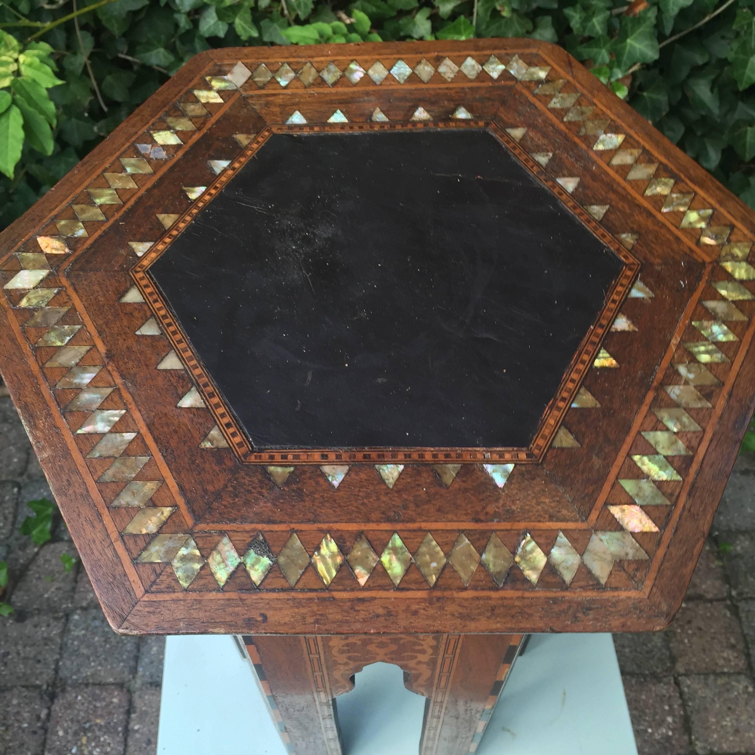 Beautiful antique Moorish table. 

Moorish antiques have always appealed to not just people with an Arab background. The beautiful shapes, the warm colors and the quality of the craftsmanship is respected and appreciated the world over. This fine