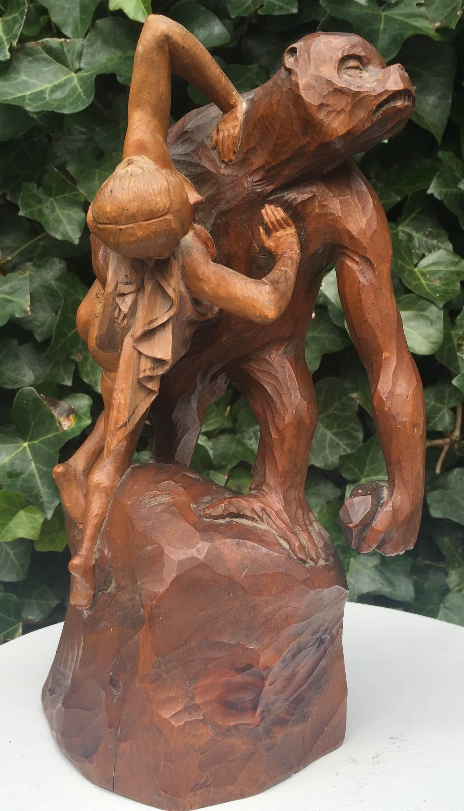 French Early 1900 Gorilla Carrying off a Woman Crafted in Wood after Emmanuel Fremiet For Sale