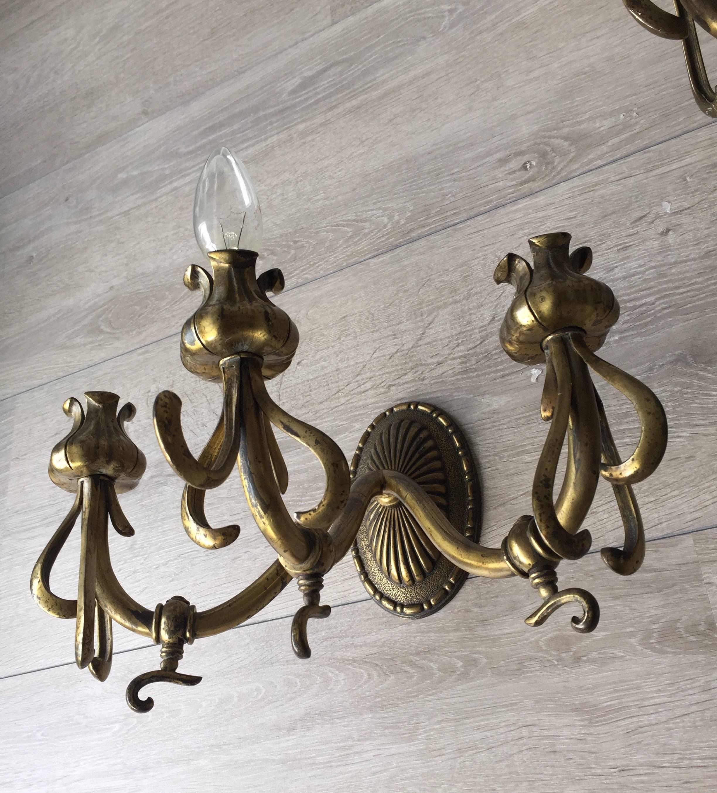 French Rare Pair of Art Nouveau Bronze Wall Sconces / Fixtures with Flower Sculptured For Sale