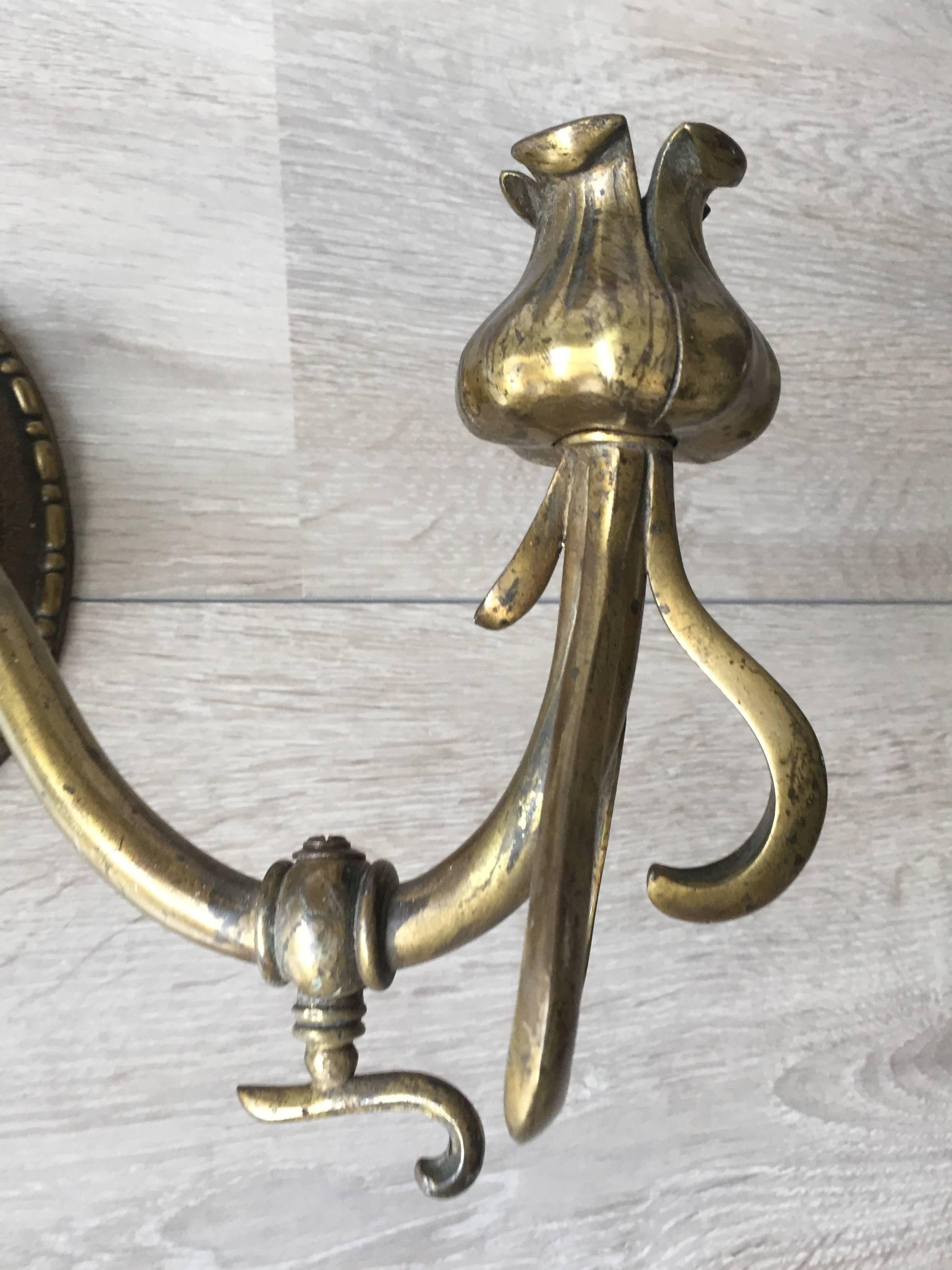 20th Century Rare Pair of Art Nouveau Bronze Wall Sconces / Fixtures with Flower Sculptured For Sale