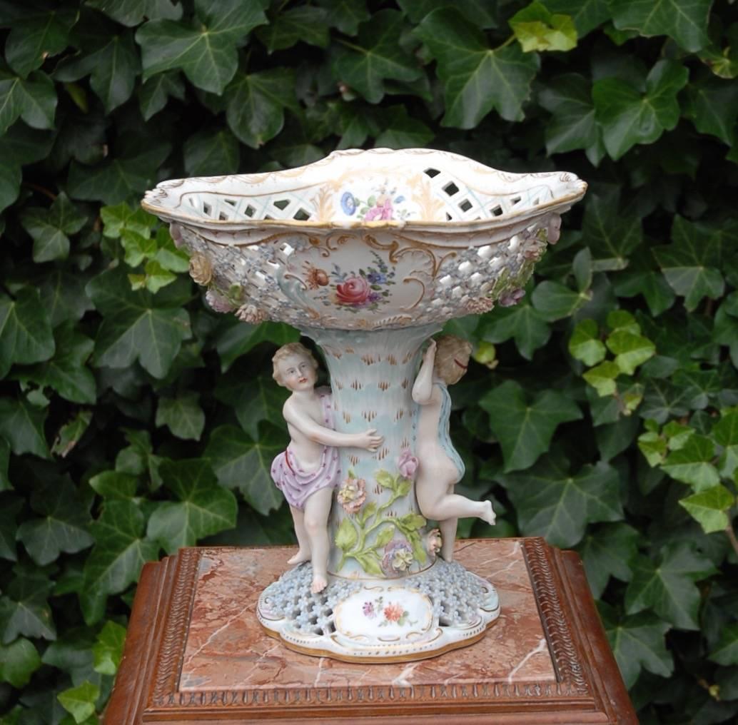 This amazing and finely detailed table centerpiece is in very good condition.

If you have the right table for this stunning antique porcelain then this eye catcher will never fail to impress. The quality in the details, the romantic colors and the