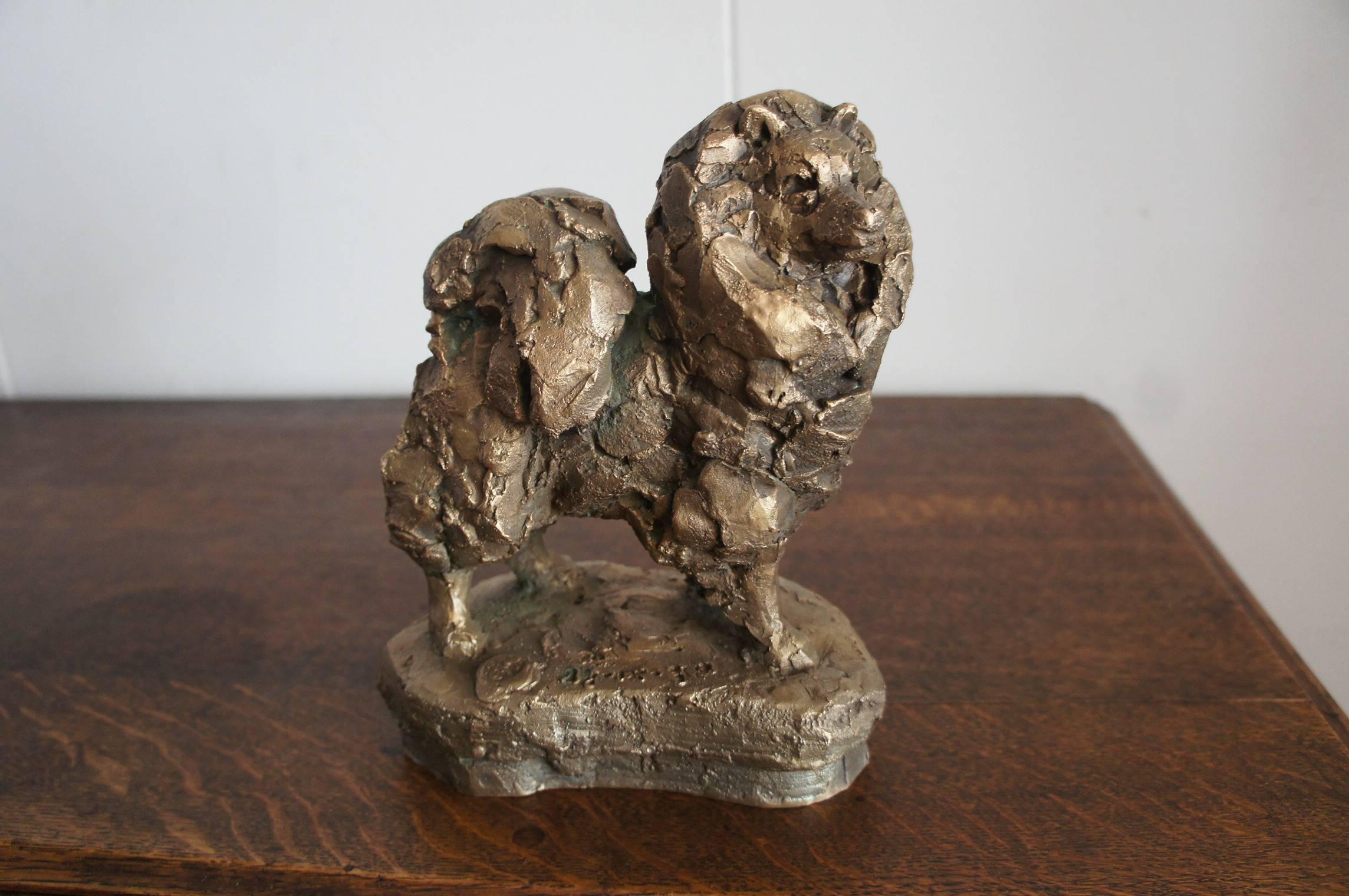 Bronze sculpture of a standing spitz dog.

Unfortunately we do not know whom this sculpture was made by nor from which country it originates. This rare example comes with a founders mark and it appears to have a date on it also (27-9-78). This could