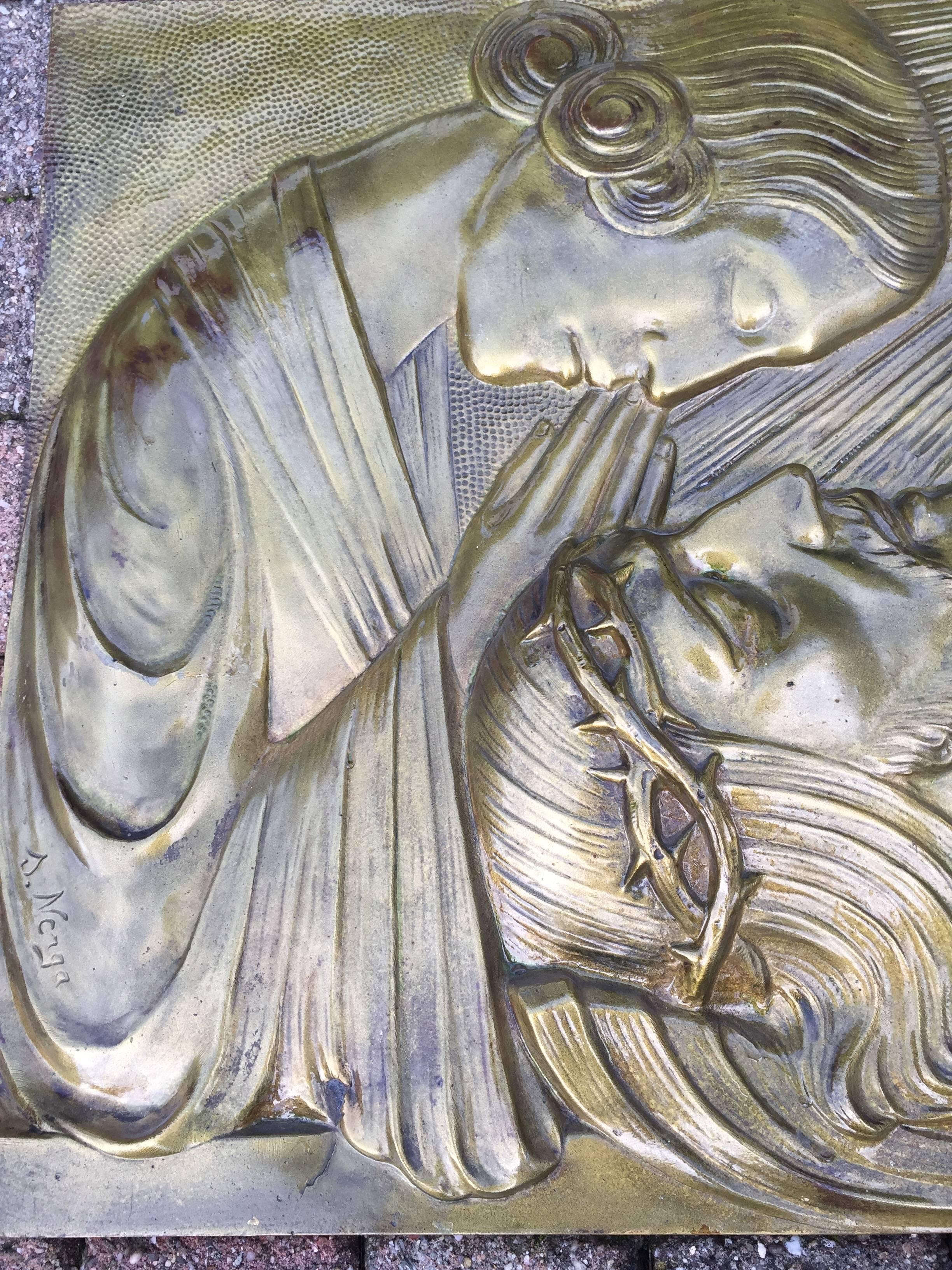 Large and heavy Art Deco bronze of the pieta by Silvain Norga

This large bronze wall plaque depicts the Virgin Mary praying over the body of Jesus Christ after the Crucifixion. The typical Art Deco hairstyle of Mother Mary and the holy light