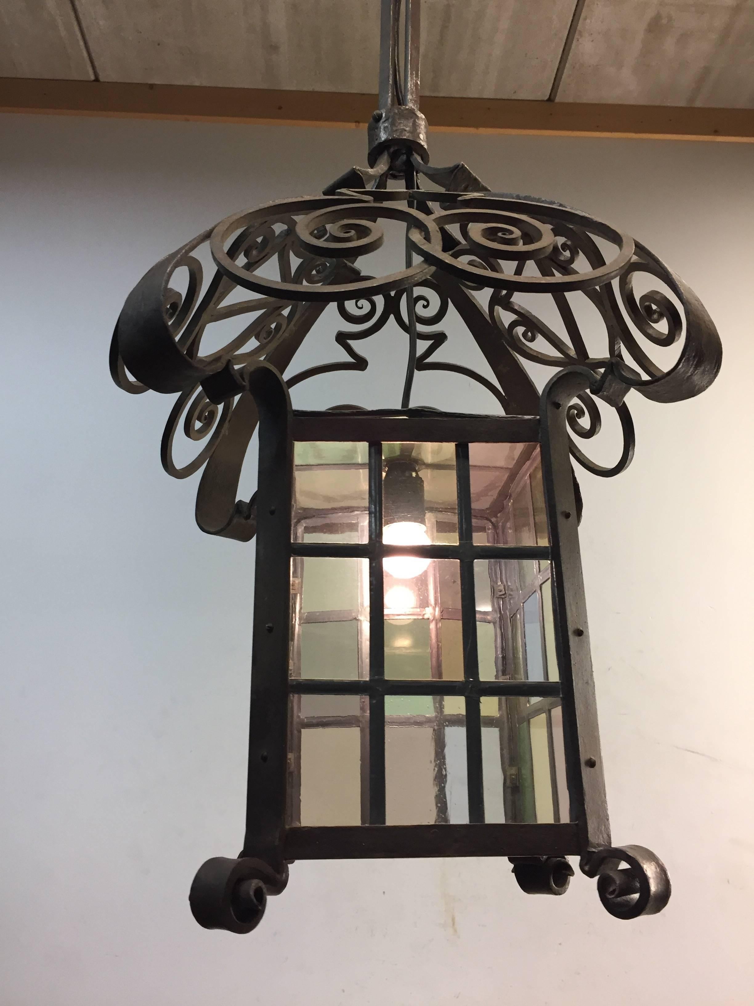 Hand-Crafted Early 1900 Large Arts & Crafts Wrought Iron Lantern / Pendant with Stained Glass For Sale