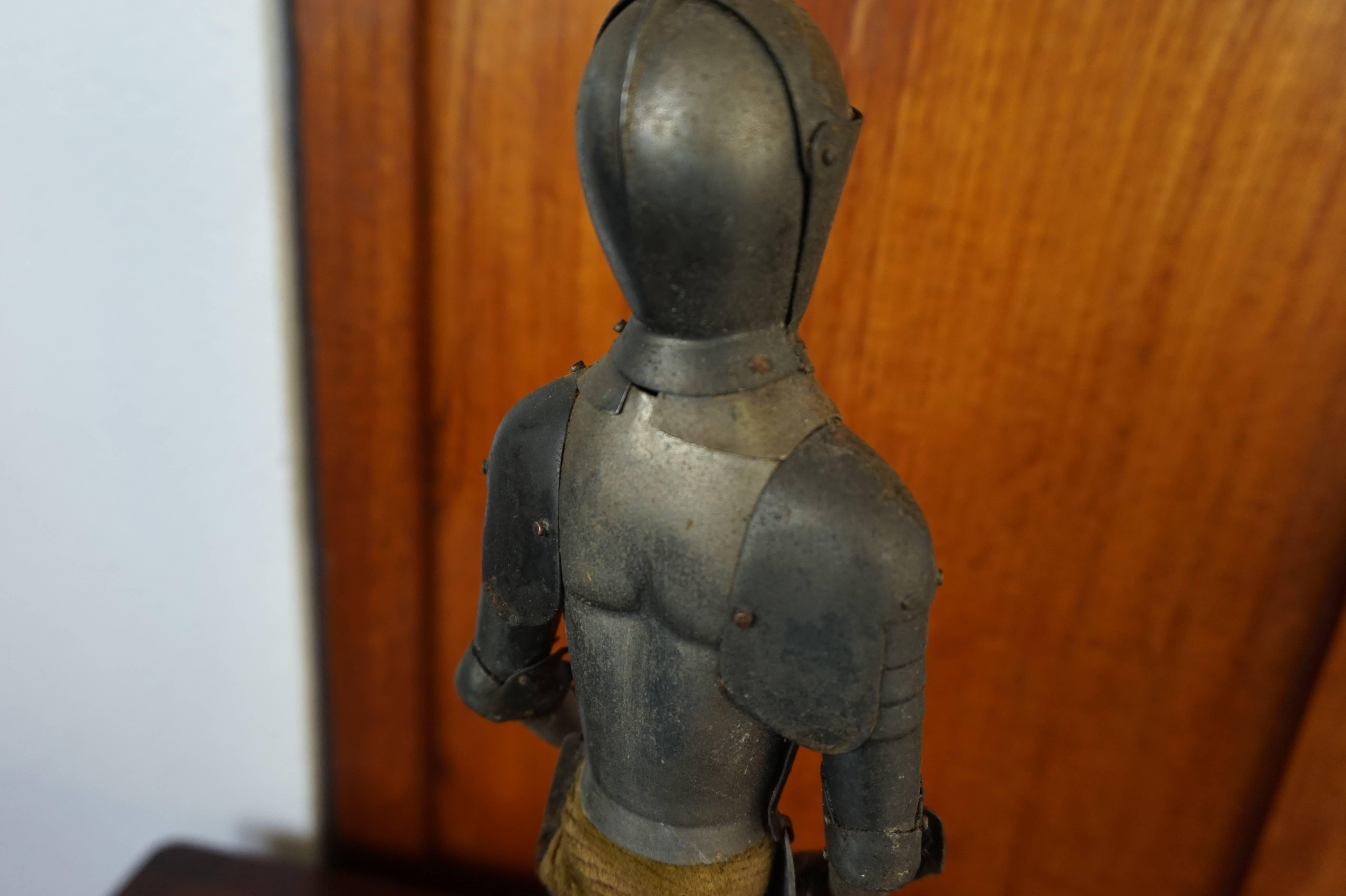 Antique Miniature Medieval Style Knight of Tin with Embossed Lion Heads 1