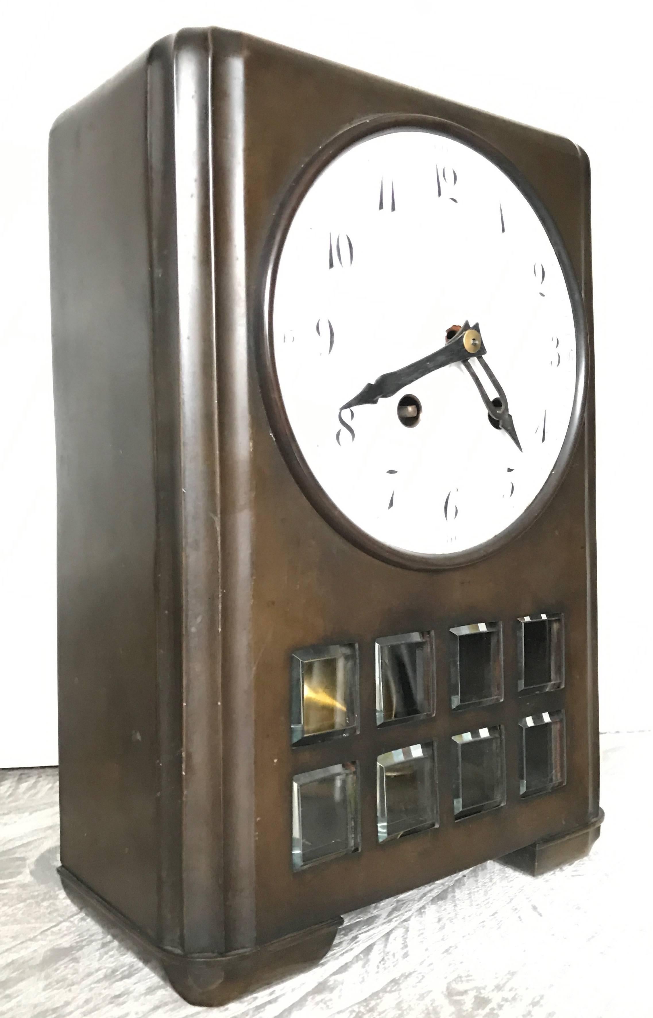 Bronze table clock from the transitional period between Art Nouveau and Art Deco.

This rare bronze table clock is by Lenzkirch and it dates from the transitional period of the Jugendstil into the Art Deco. This German cast bronze clock comes with