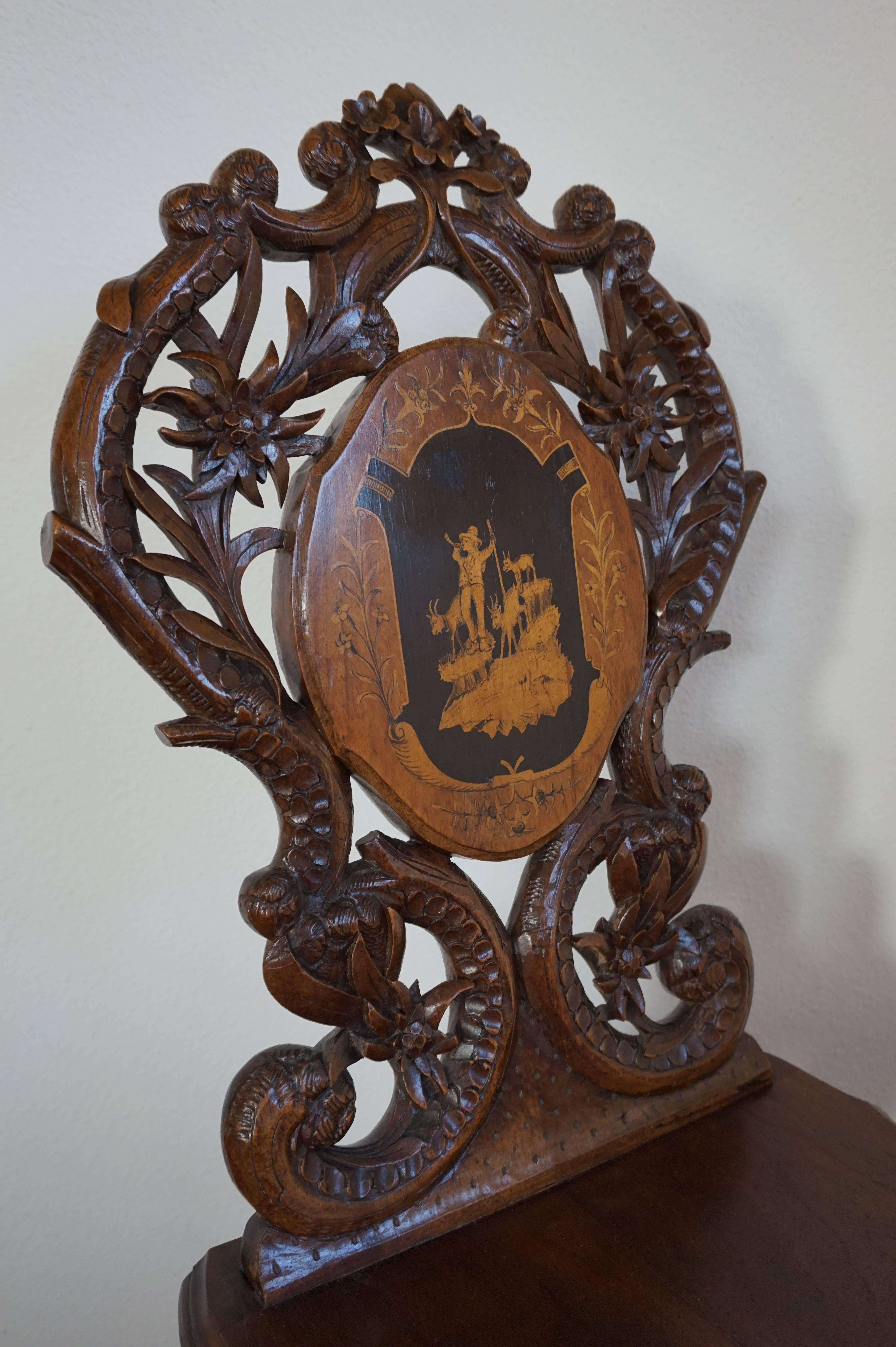 Decorative Black Forest hall chair.

This well crafted hall chair from the late 1800s has the whole back of the chair carved out of one piece. This back still looks as stunning as it did 120 years ago. It may even look better now, because of the