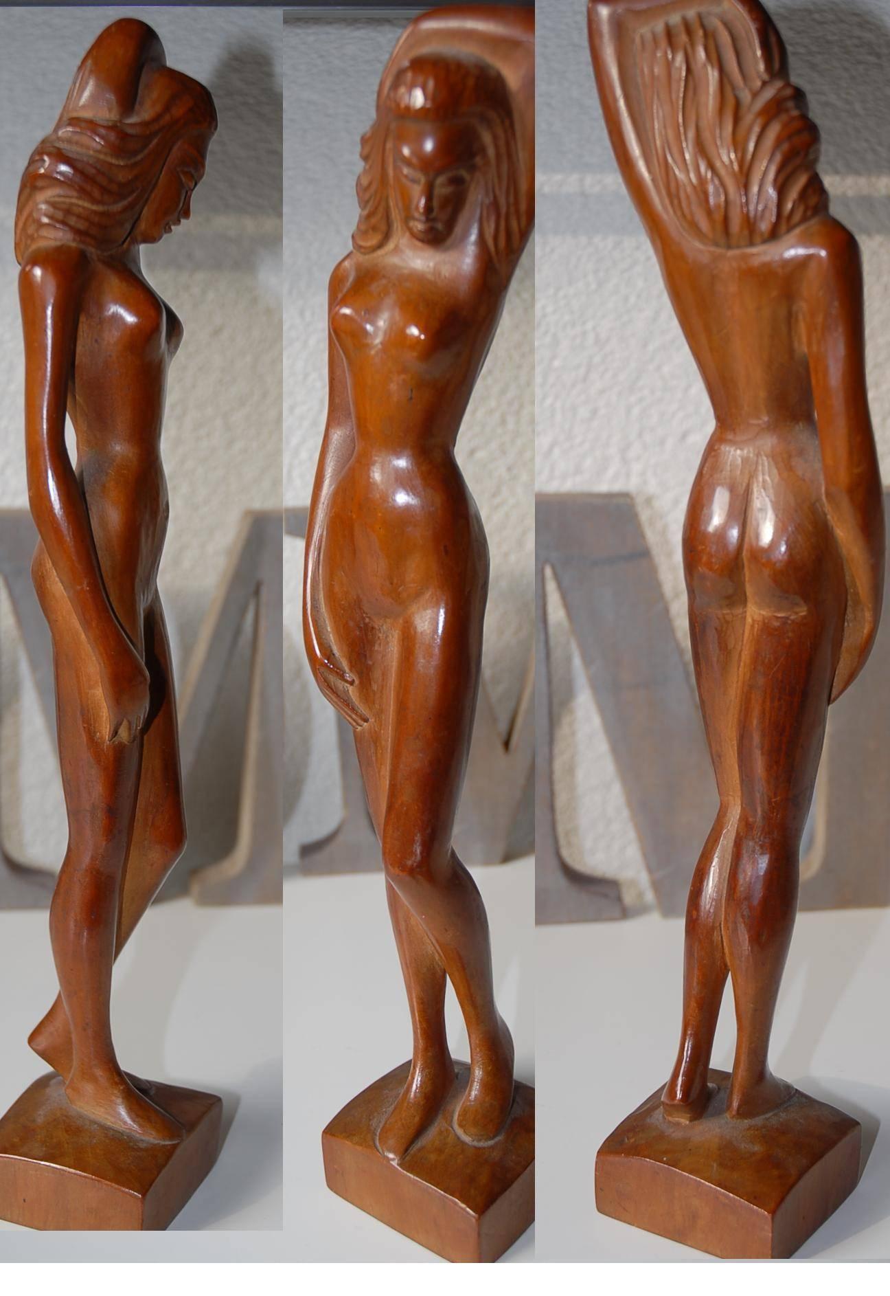 Stylish and decorative wooden female nude sculpture.

This hand-carved nude lady from the 1920s is in excellent condition. Her natural poisture is a very relaxed one and only a few of these type of artworks by Barend Jorden have appeared onto the