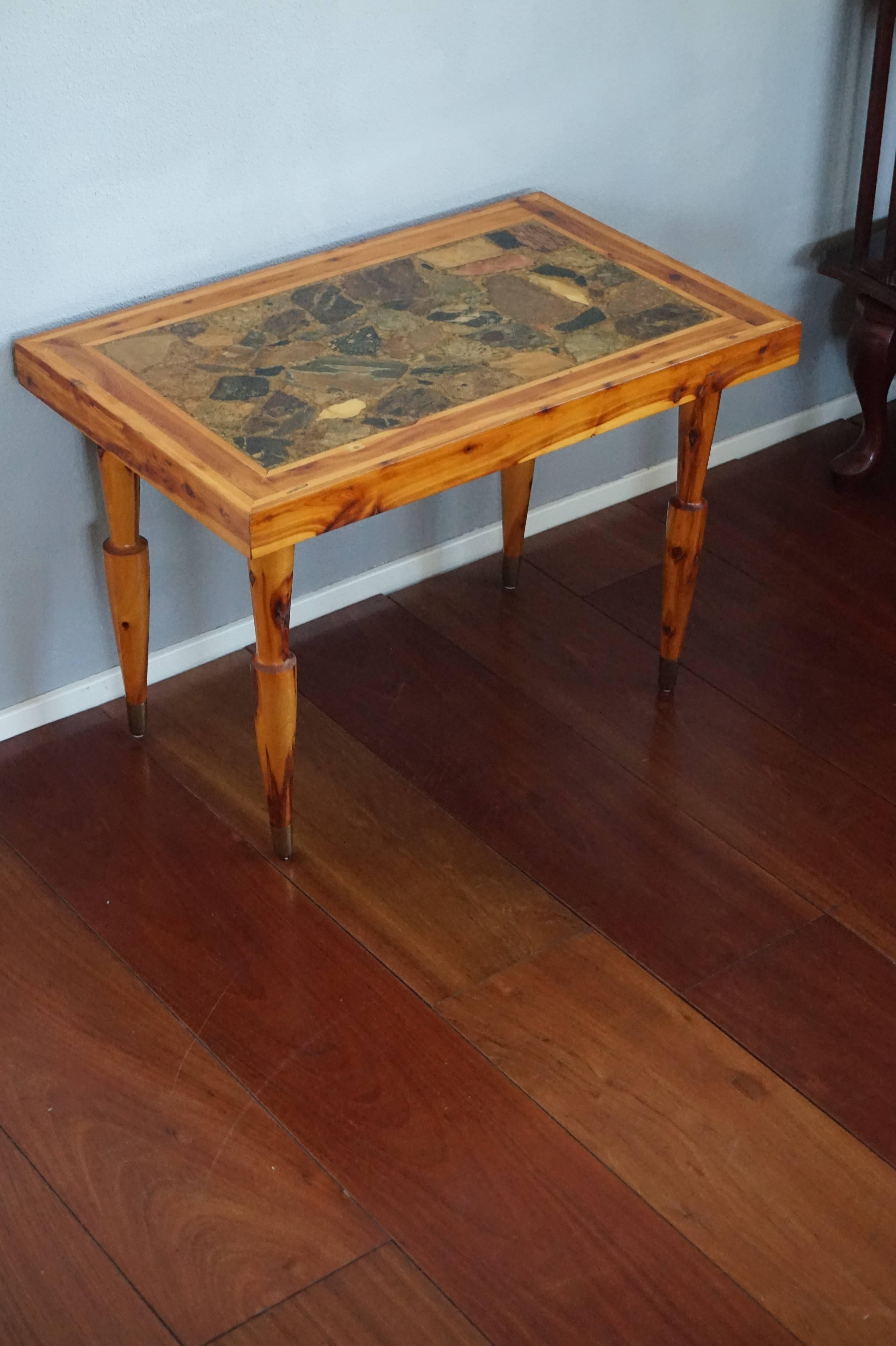 Terrific juniper table inlaid with natural rock made in British Columbia.

This vintage Canadian, juniper coffee table is unique on 1stdibs and extremely rare in the world. We cannot find a second one anywhere in the world. This fine Mid-Century