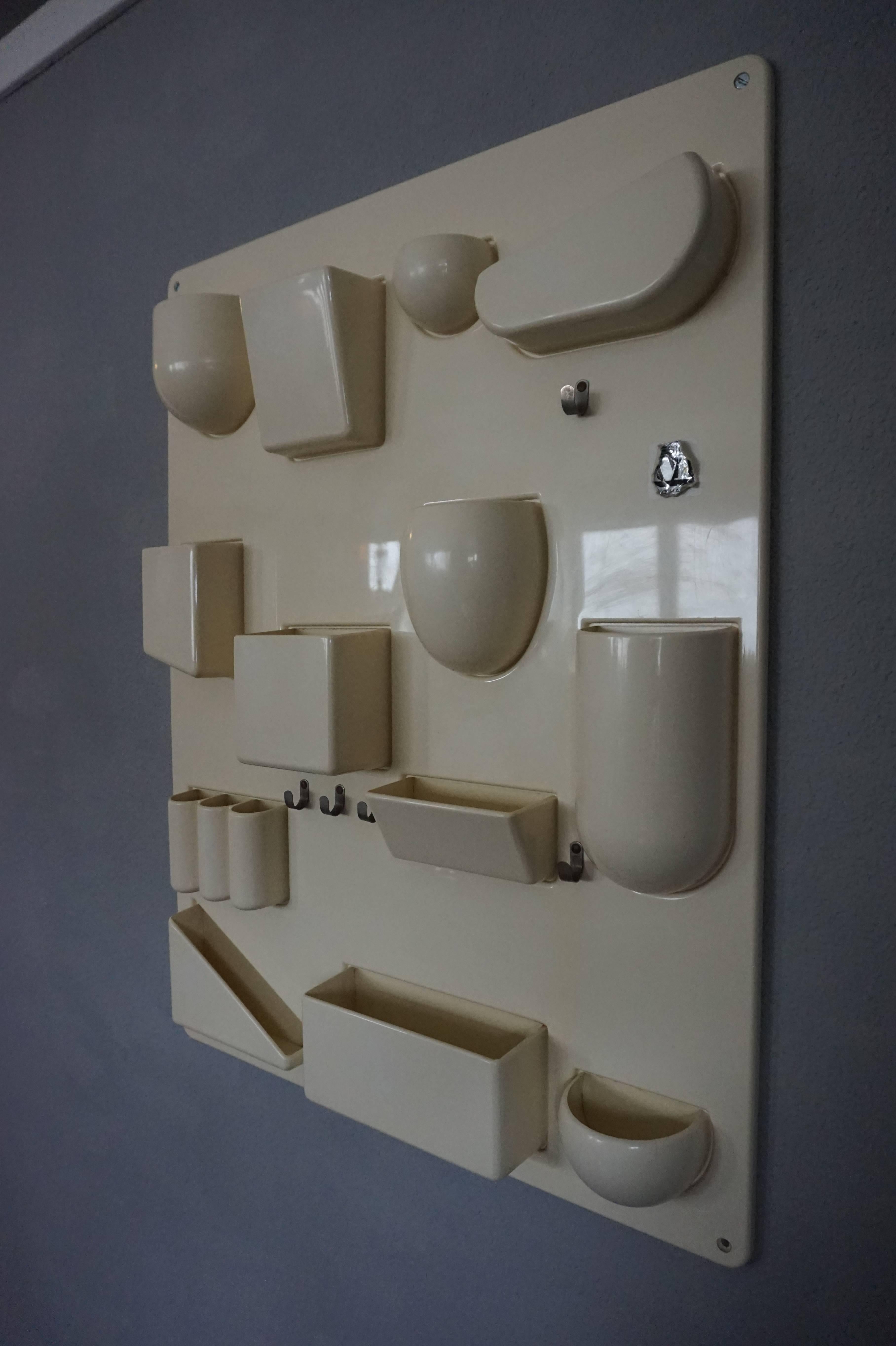 Here's another collectible at a great price.

This molded plastic, vintage design wall organizer by Ingo Maurer needs no further introduction. This design by Dorothee Becker is a joy to look at and very practical to use. It will look great on the