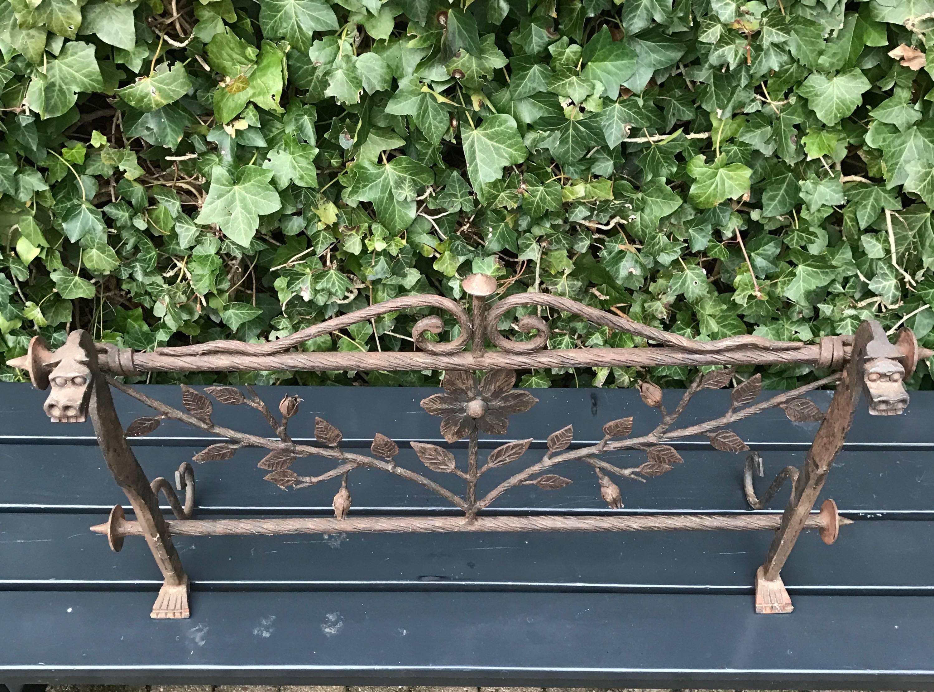 Decorative hand-forged screen with floral decor.

This artistic and handcrafted wrought iron fire screen will change the look and feel of your fireplace in an instant. The quality of the workmanship and the balance of this wrought iron artwork is