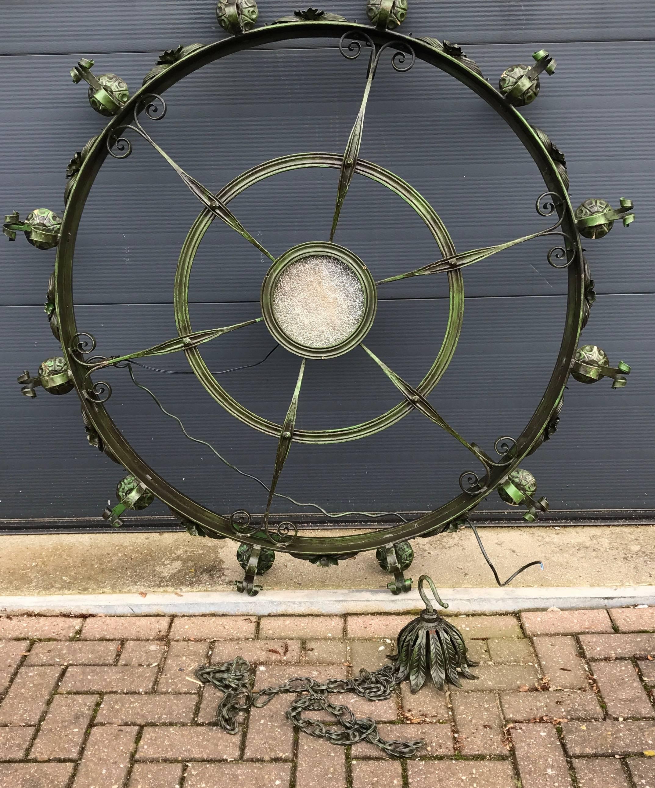 Dutch Enormous Crafted Wrought Iron Chandelier w. 12 Torch Lights and One Centre Light For Sale