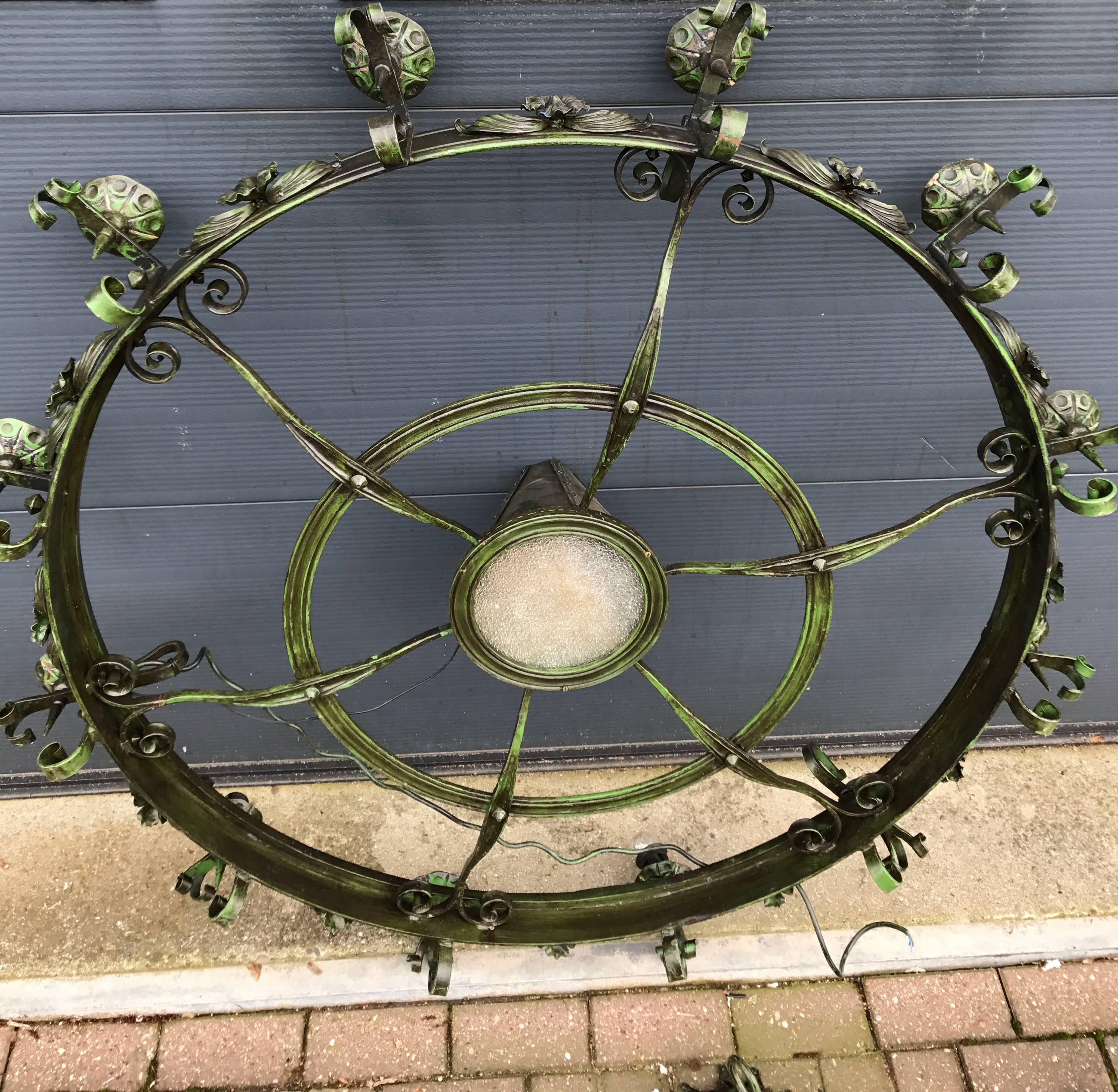 Enormous Crafted Wrought Iron Chandelier w. 12 Torch Lights and One Centre Light In Excellent Condition For Sale In Lisse, NL