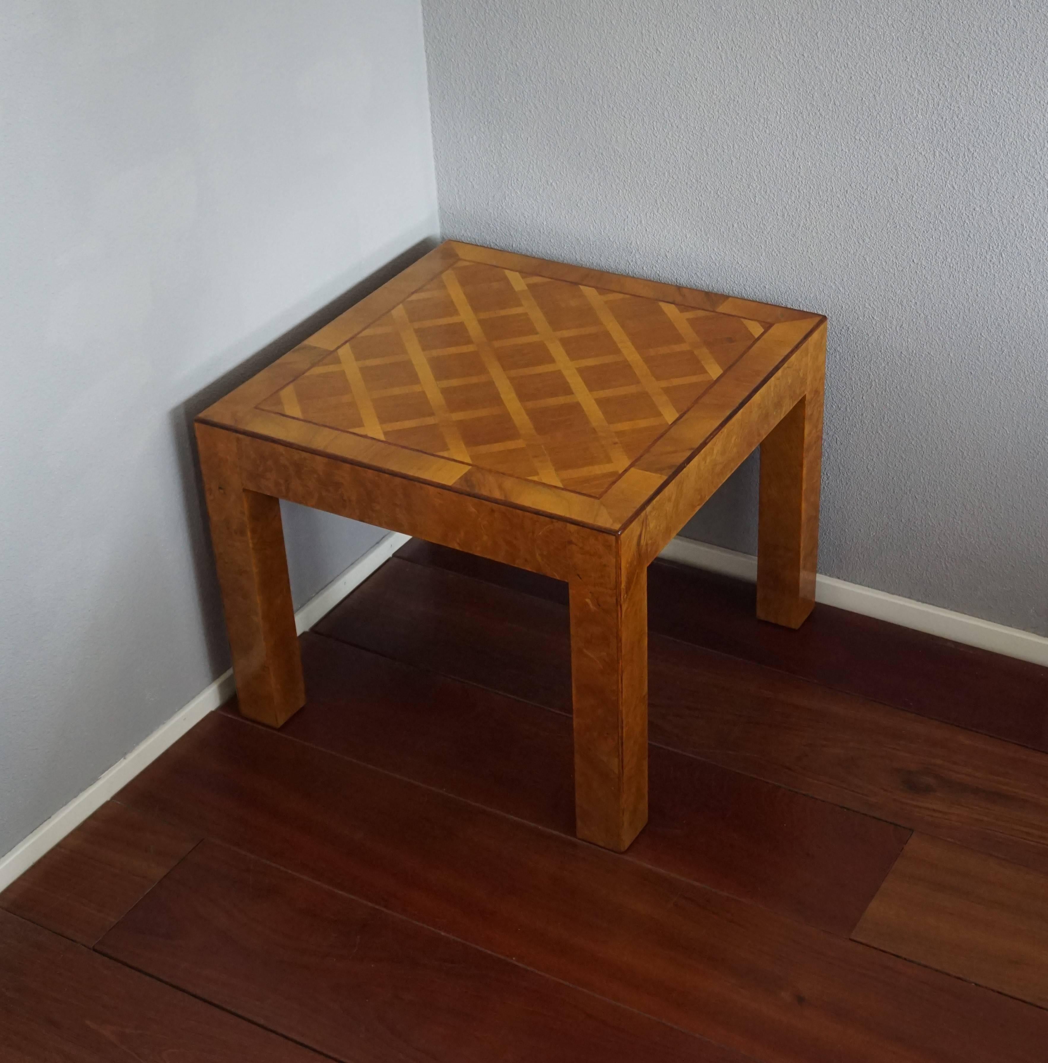 Top quality and excellent condition end table.

This terrific mid-late 20th century table is interesting for many reasons. The condition is second to none, the design is striking and a joy to watch, the size is practical for many purposes and the