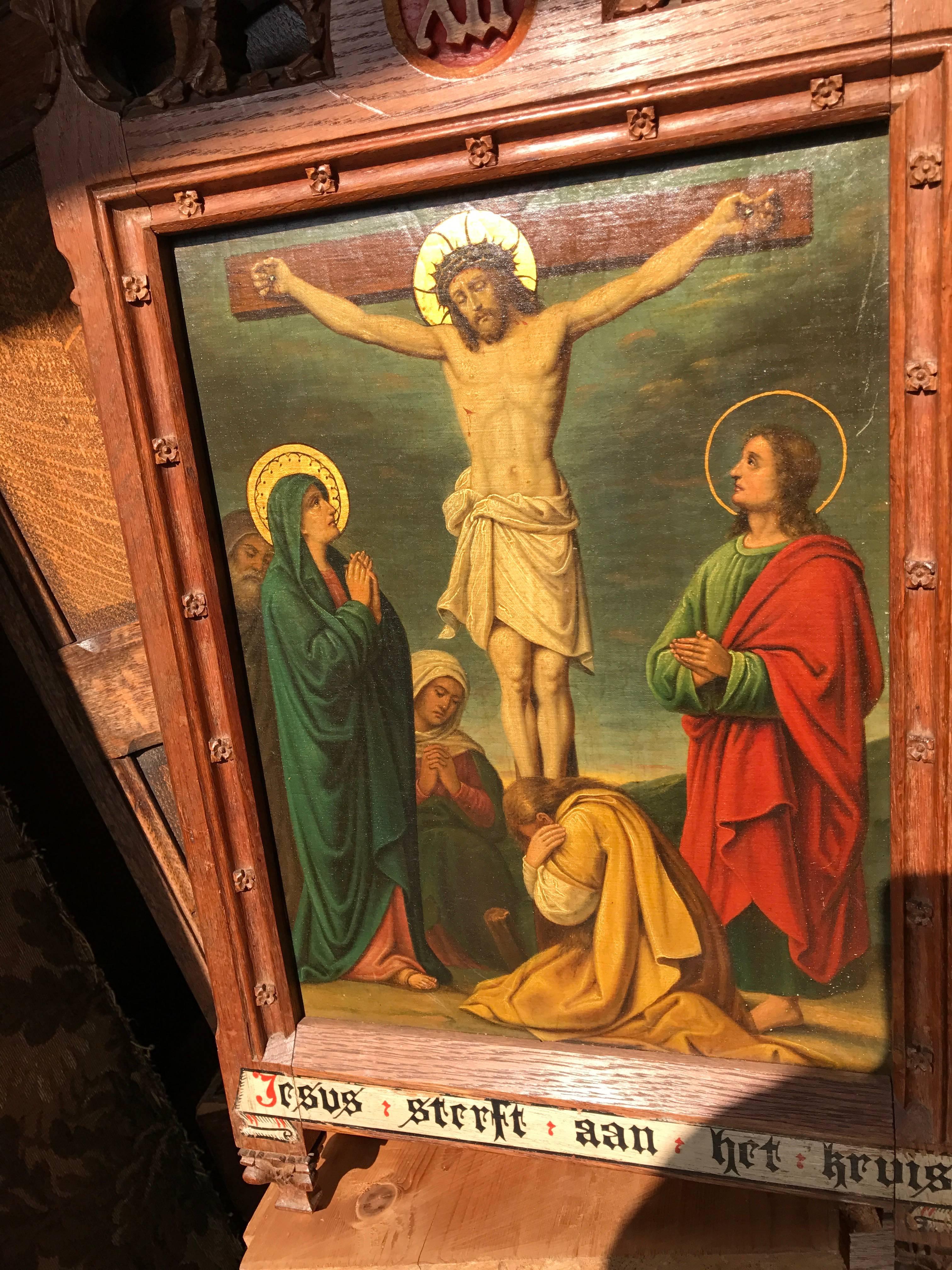 Another stunning religious work of fine art.

This polychrome painting on metal depicts Jesus, hanging on the cross with Mary, John and Mary Magdalene to support him.

This painting is framed in a beautifully carved, Gothic Revival oak frame. The