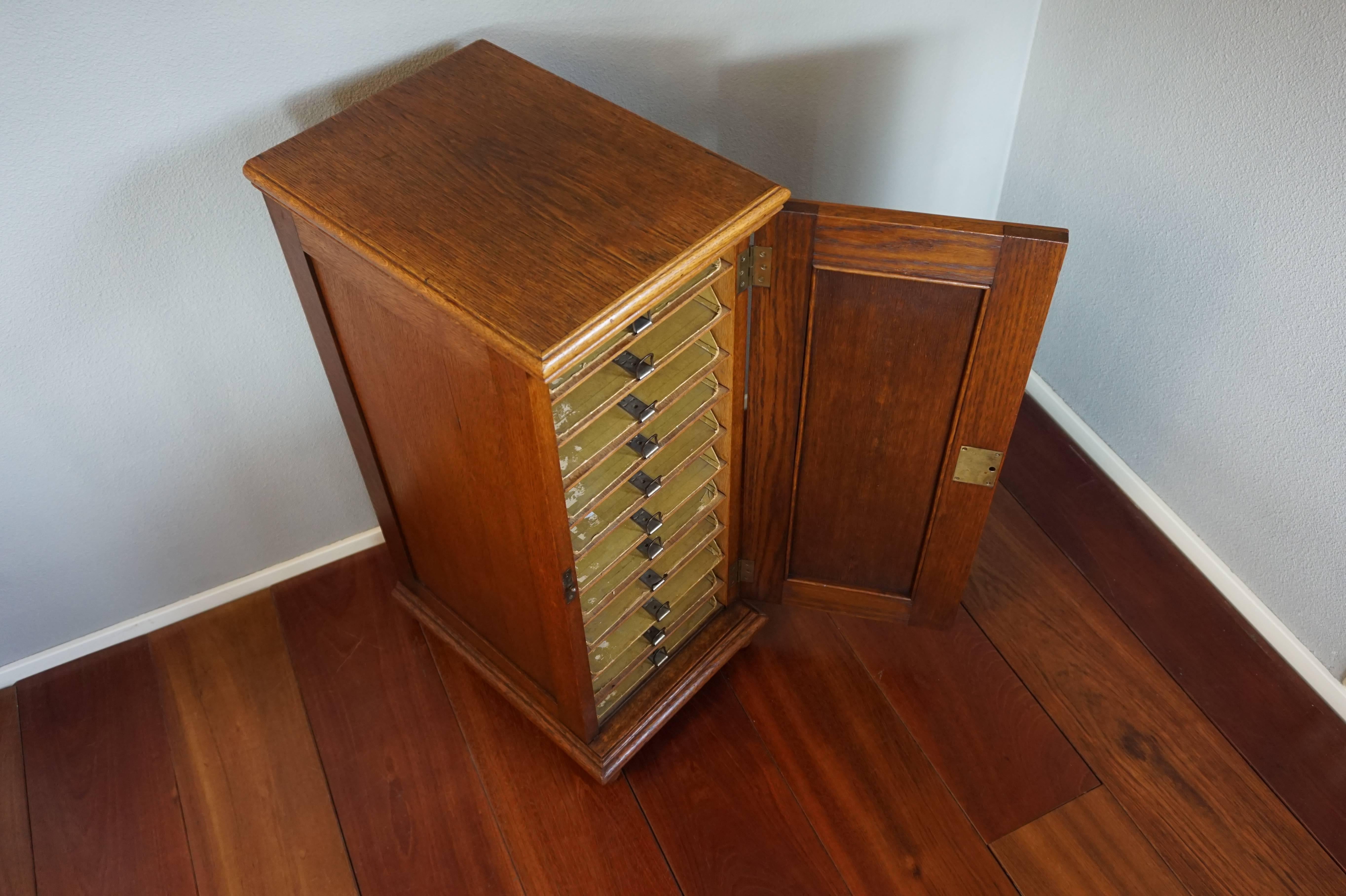 Stunning little handcrafted filing cabinet with lock and key.

This timeless design, handcrafted, all original and very practical filing cabinet was used by the former owner for keeping music paper. We have never seen such a handy and practical