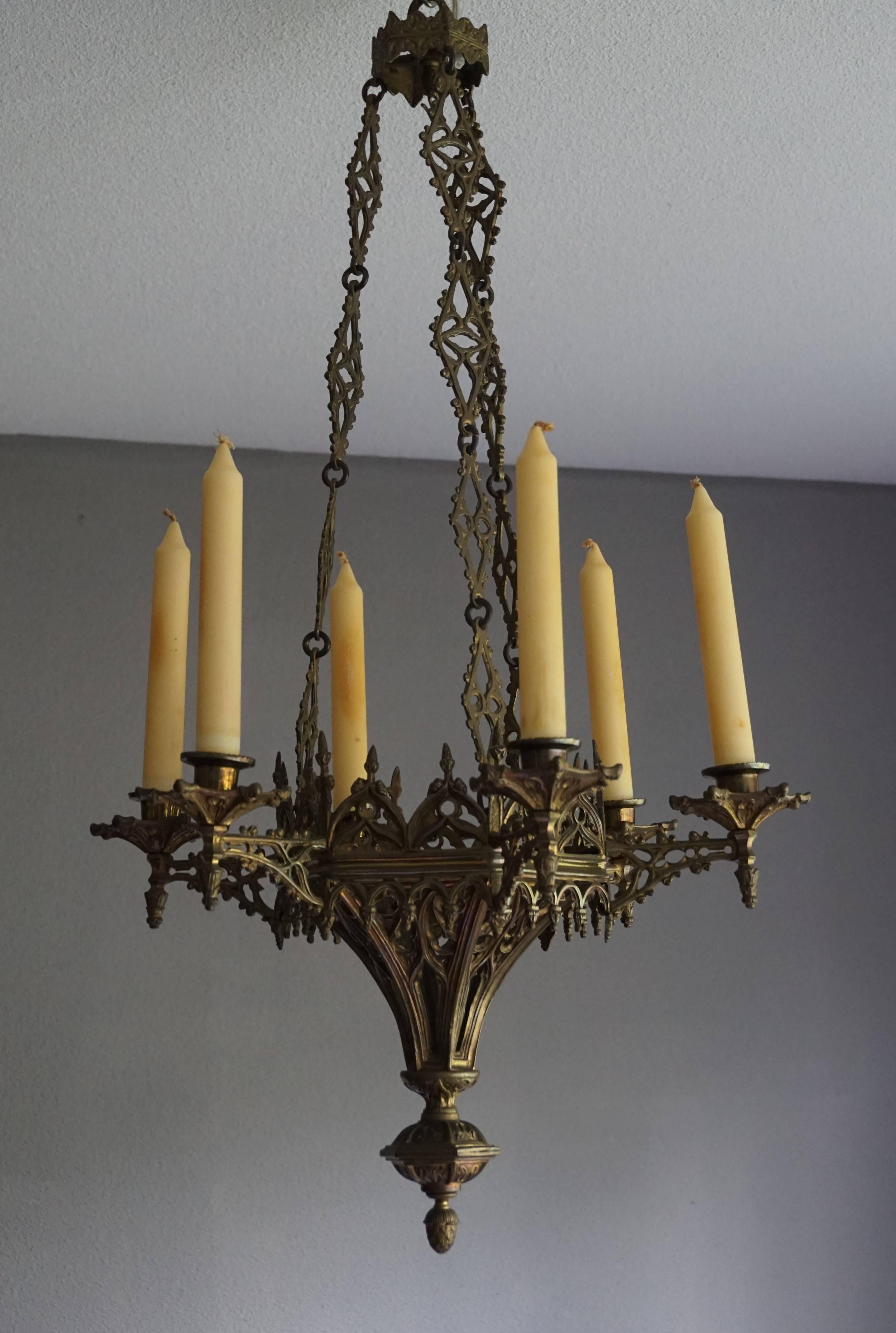 Handcrafted wonderful chandelier with a great look and feel.

The amount of work that has gone into making this striking chandelier is almost unimaginable in this day and age. Before you can start to cast the individual pieces (and there are many on