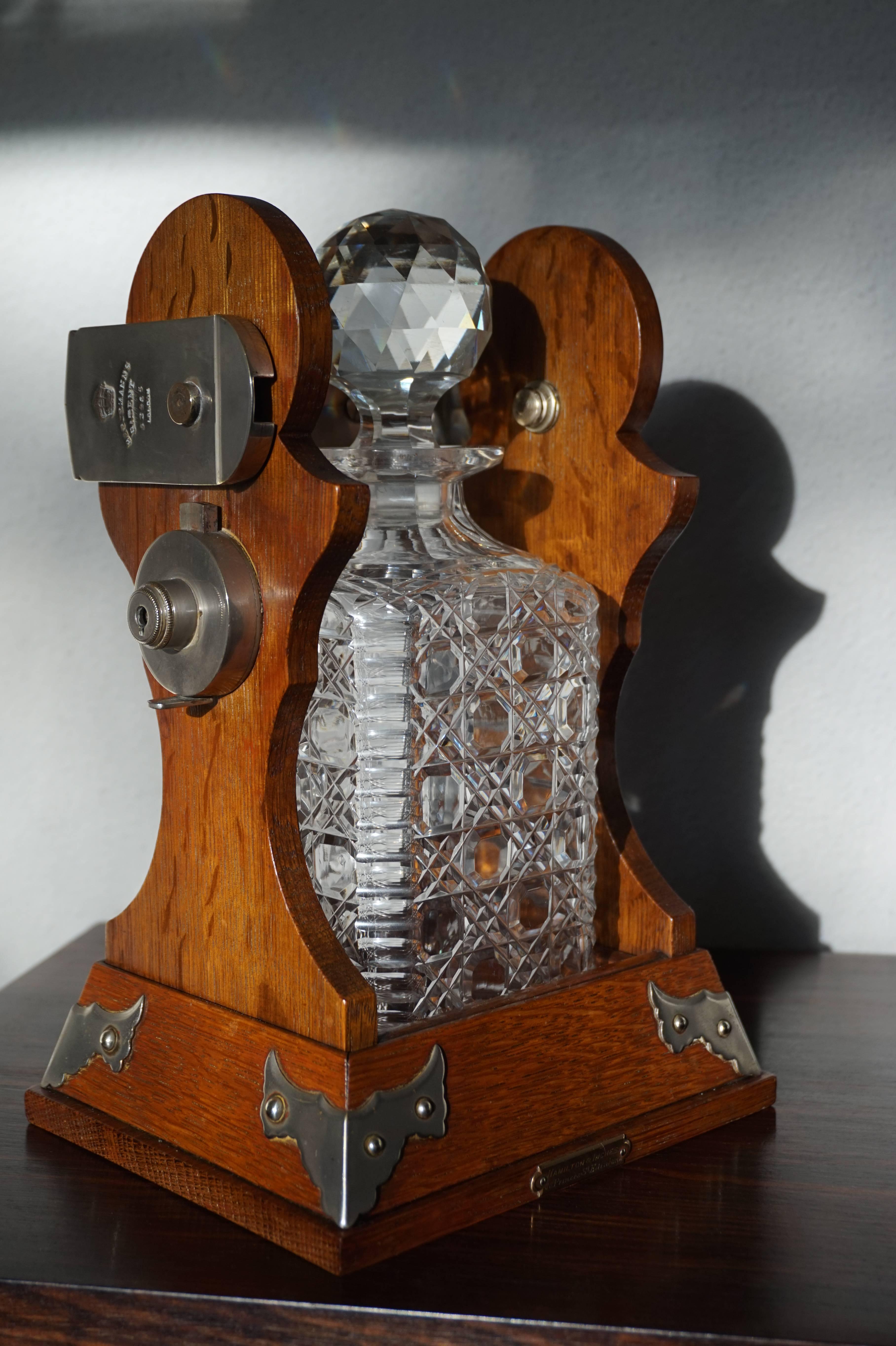 Striking tantalus and crystal decanter by a famous Scottish or a famous English maker.

This amazing condition and rare single bottle Tantalus will look great everywhere. It dates from circa 1900-1910 and it is (marked) by Hamilton & Inches of