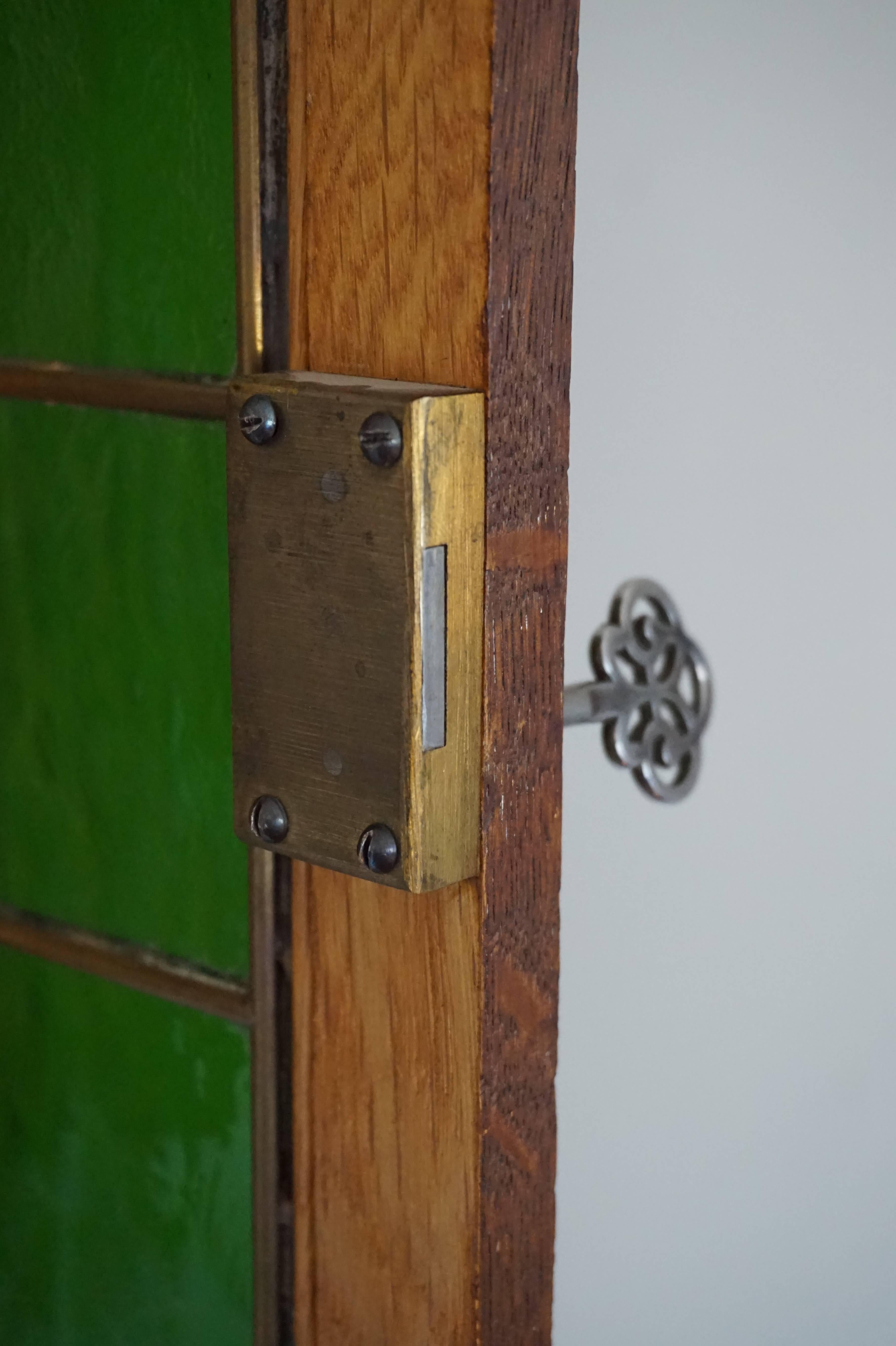Stunning Little Arts and Crafts Wall Cabinet for Keys with Brass and Green Glass 2