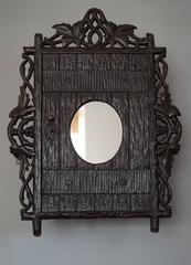 Antique and Hand-Carved Black Forest Medicine Wall Cabinet with Oval Mirror