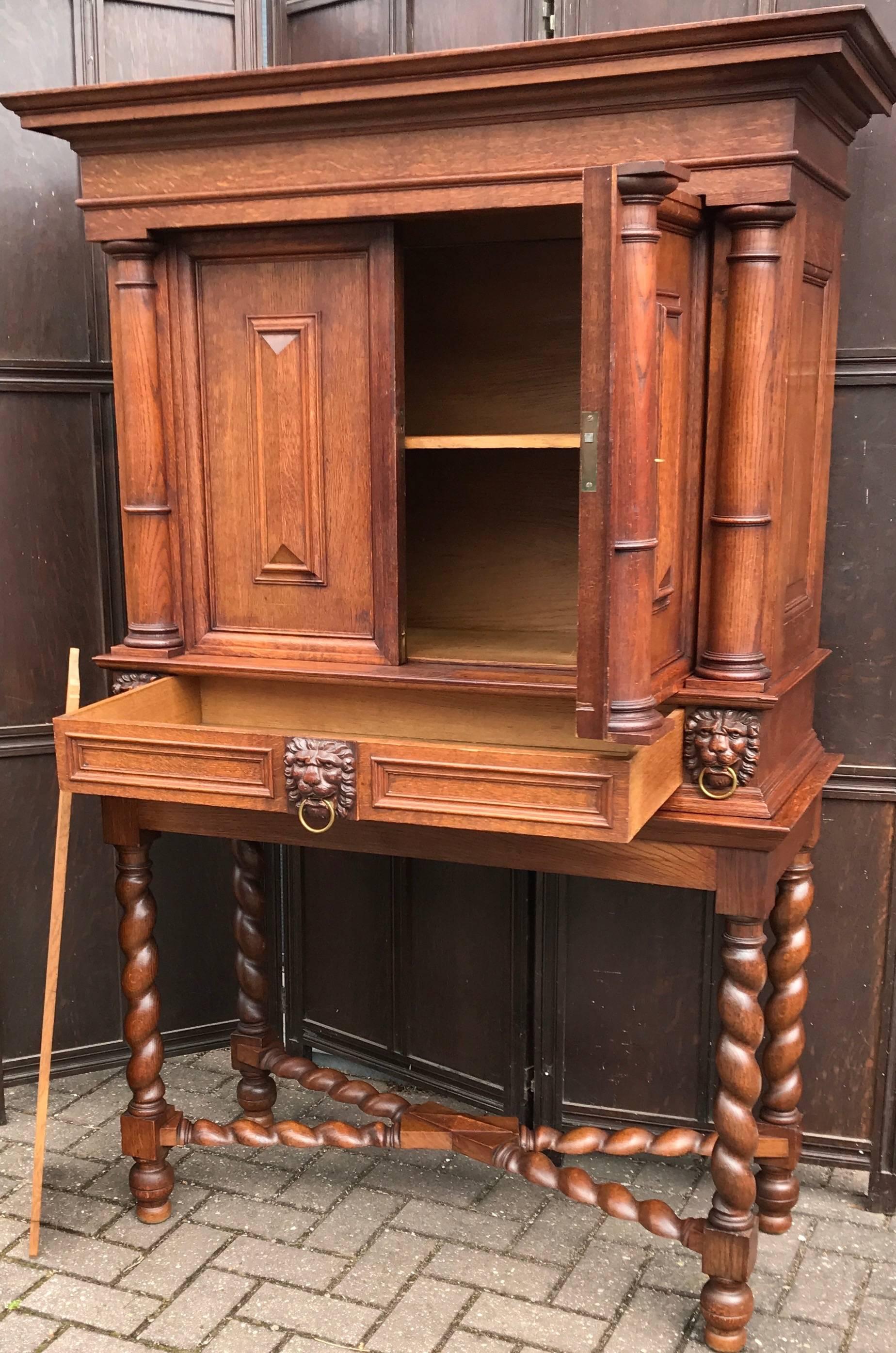 19th Century Stunning Baroque Revival Tiger Oak Cabinet with Lion Heads and Barley Twist Base For Sale