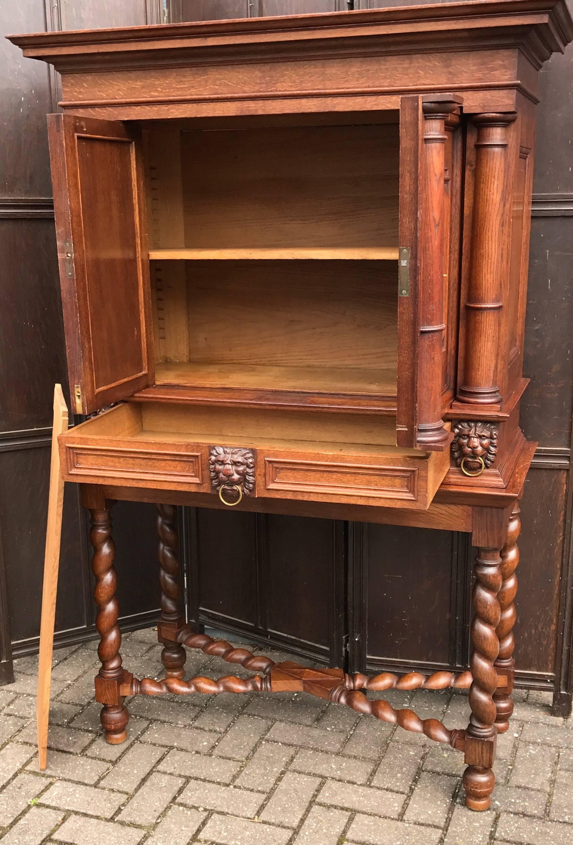 Wood Stunning Baroque Revival Tiger Oak Cabinet with Lion Heads and Barley Twist Base For Sale