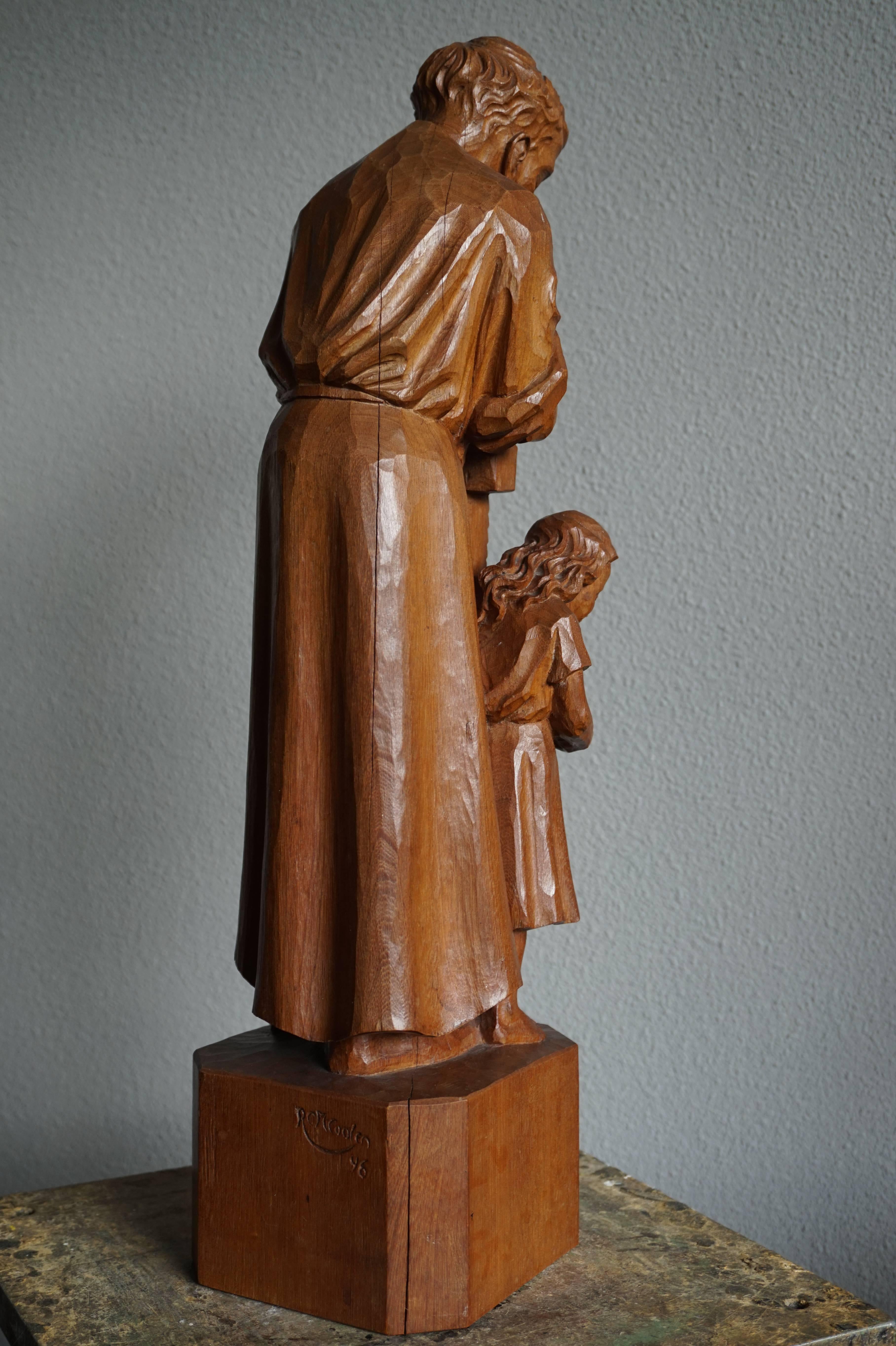 Impressive Hand-Carved Mourning Father and Daughter Sculpture of Afromosia Wood In Excellent Condition For Sale In Lisse, NL