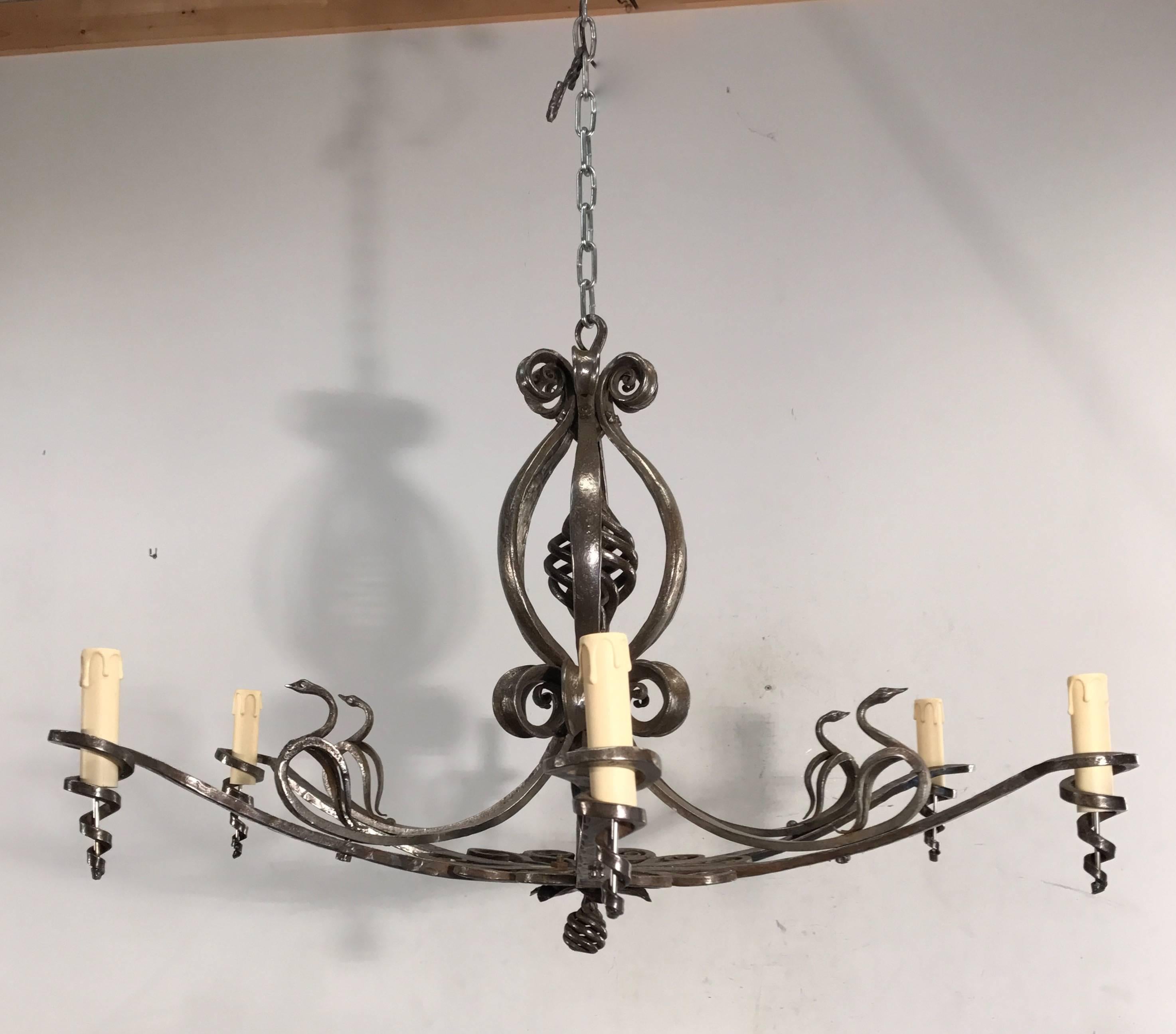 Wonderful antique and handcrafted six-light chandelier.

If you are searching for an elegant and unique chandelier to, for example, complete a dining room or a large entrance then this handcrafted work of art should be on your shortlist. This