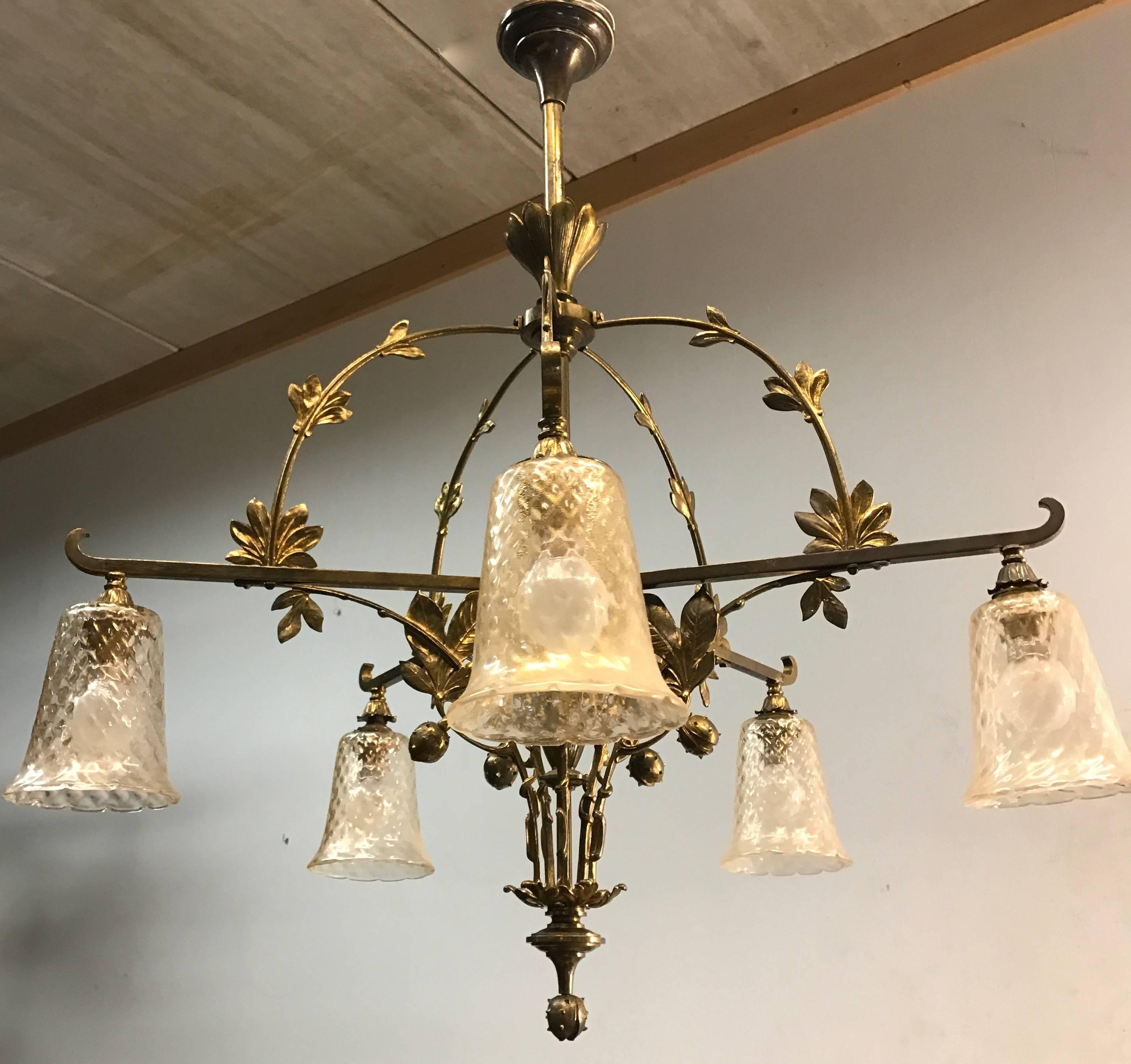Unique and magnificent work of lighting art from the Arts & Crafts / Jugendstil / Art Nouveau era.

The maker of this unique and top quality chandelier from the early 20th century was definitely inspired by the beauty of nature. The realistic and