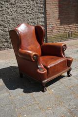 Antique Leather Chippendale Style Wingback Chair with Hand-Carved Claw Feet