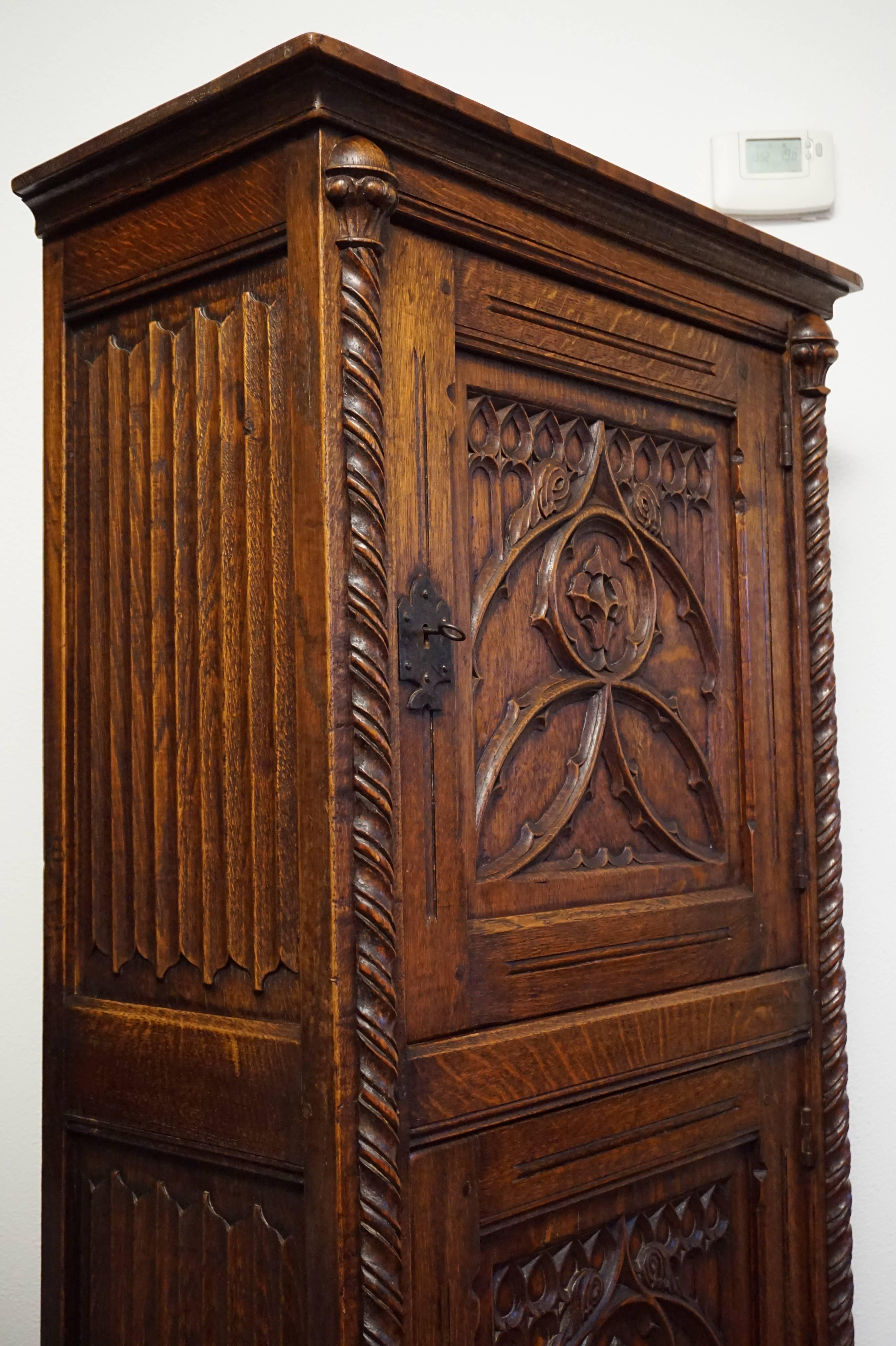 Gothic Revival Bookcase Carved Antique Cabinet with Wrought Iron Lock Plates In Excellent Condition In Lisse, NL