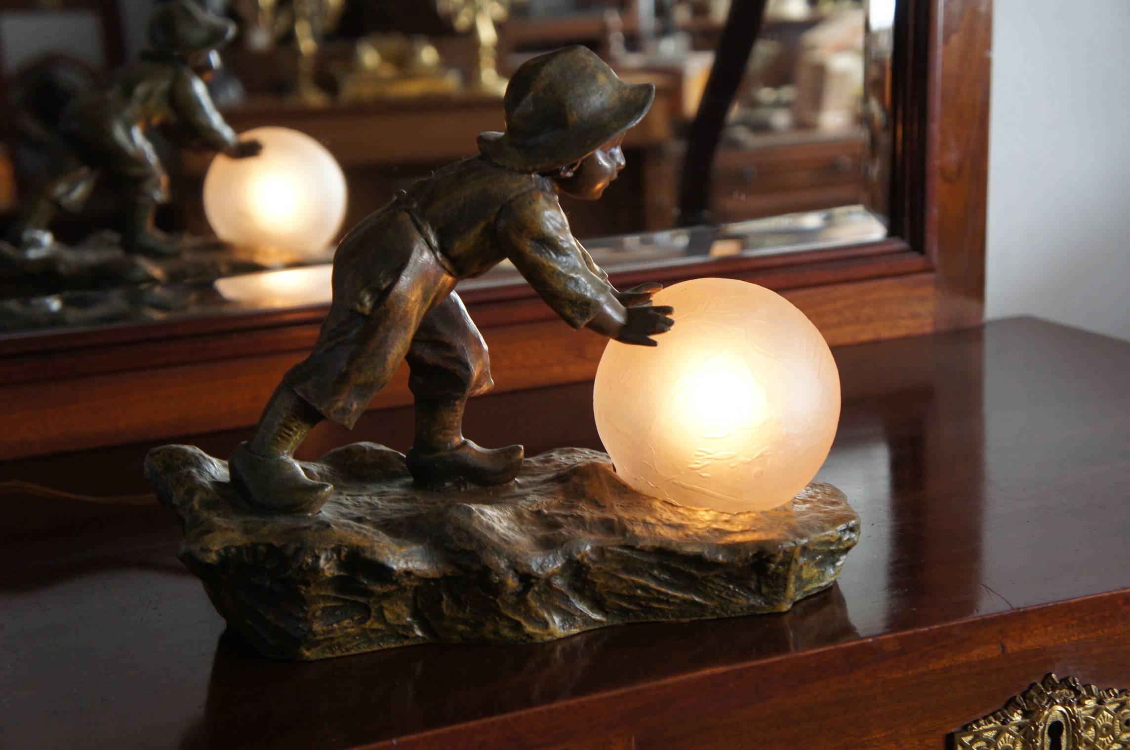 Bronzed Playful Antique Jugendstil Boy and Snowball Table or Desk Lamp by A. de Ranieri For Sale