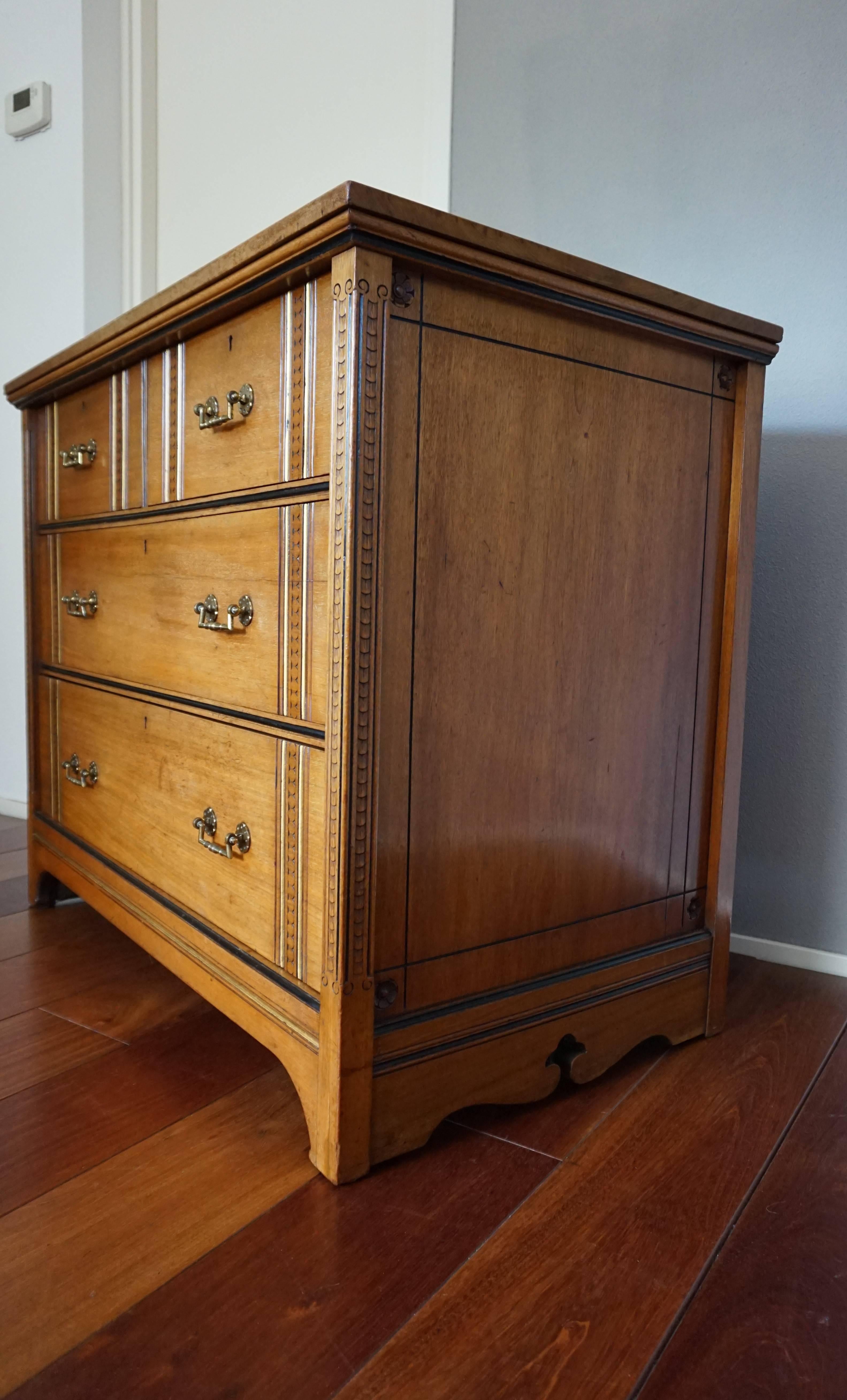 Majestic Gillow of Lancaster chest of drawers.

This wonderfully designed, hand-carved, gilt and ebonized nutwood chest of drawers is not in the style of, not almost certainly by, not after, not in the manner of, nor is it attributed to Gillow it is