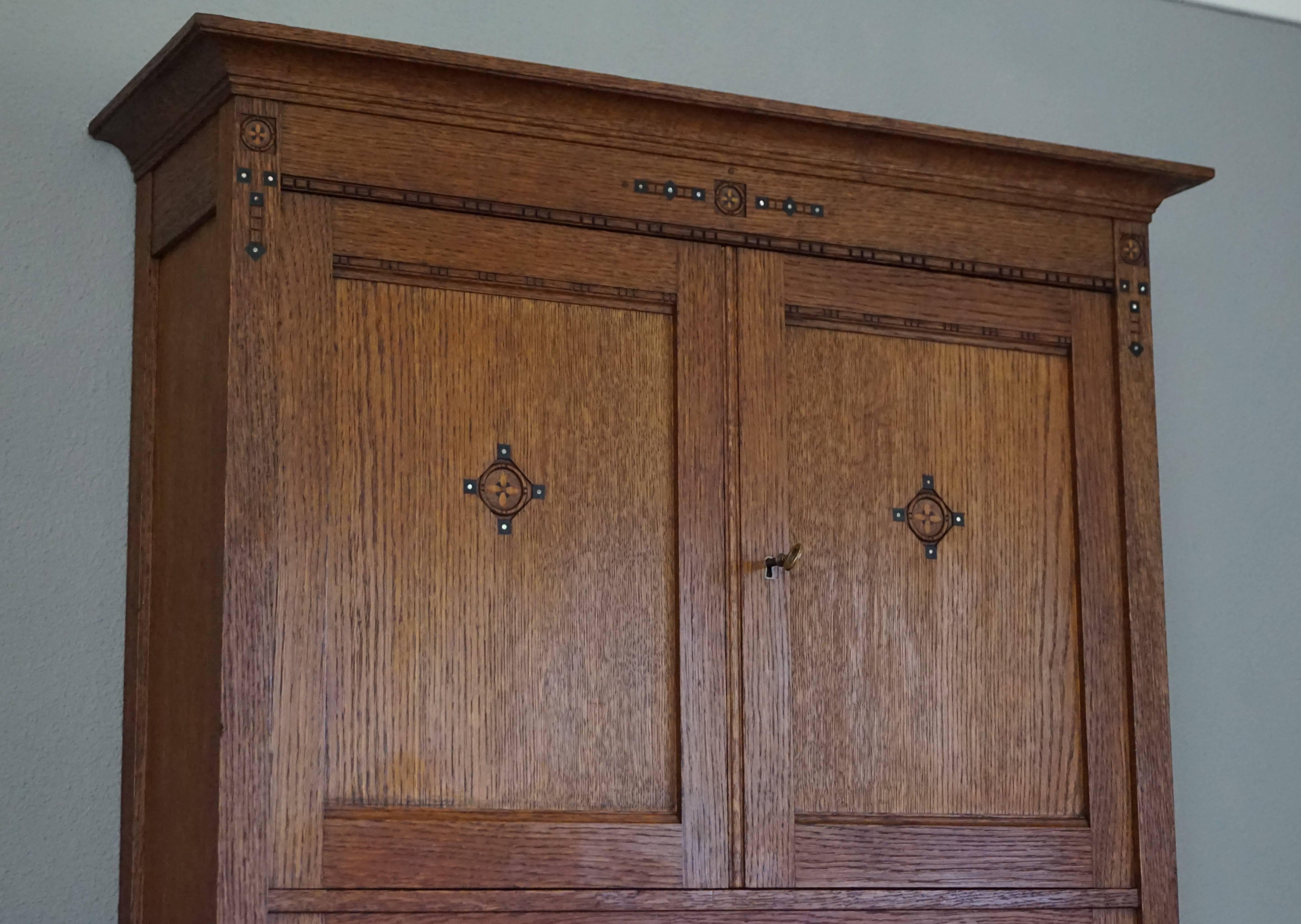 Top quality and great condition wall cabinet with maker's name.

This amazing quality and top condition wall cabinet dates back to 1900-1910 and we are certain you will never find another one. This unique antique is entirely made of solid oak and