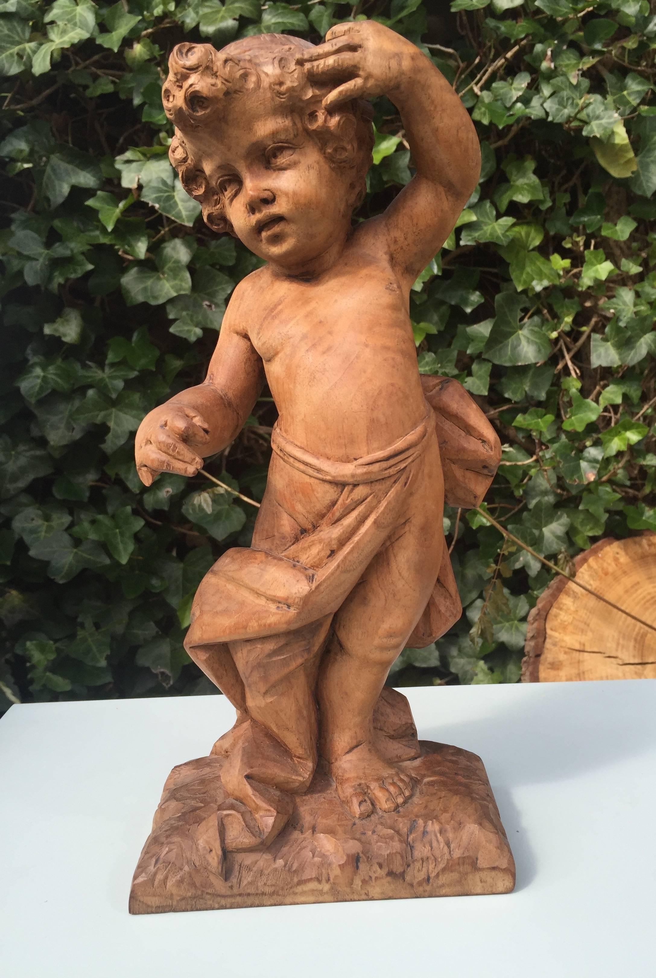 Baroque Early 19th Century French Hand-Carved Nutwood Putto Boy Sculpture For Sale