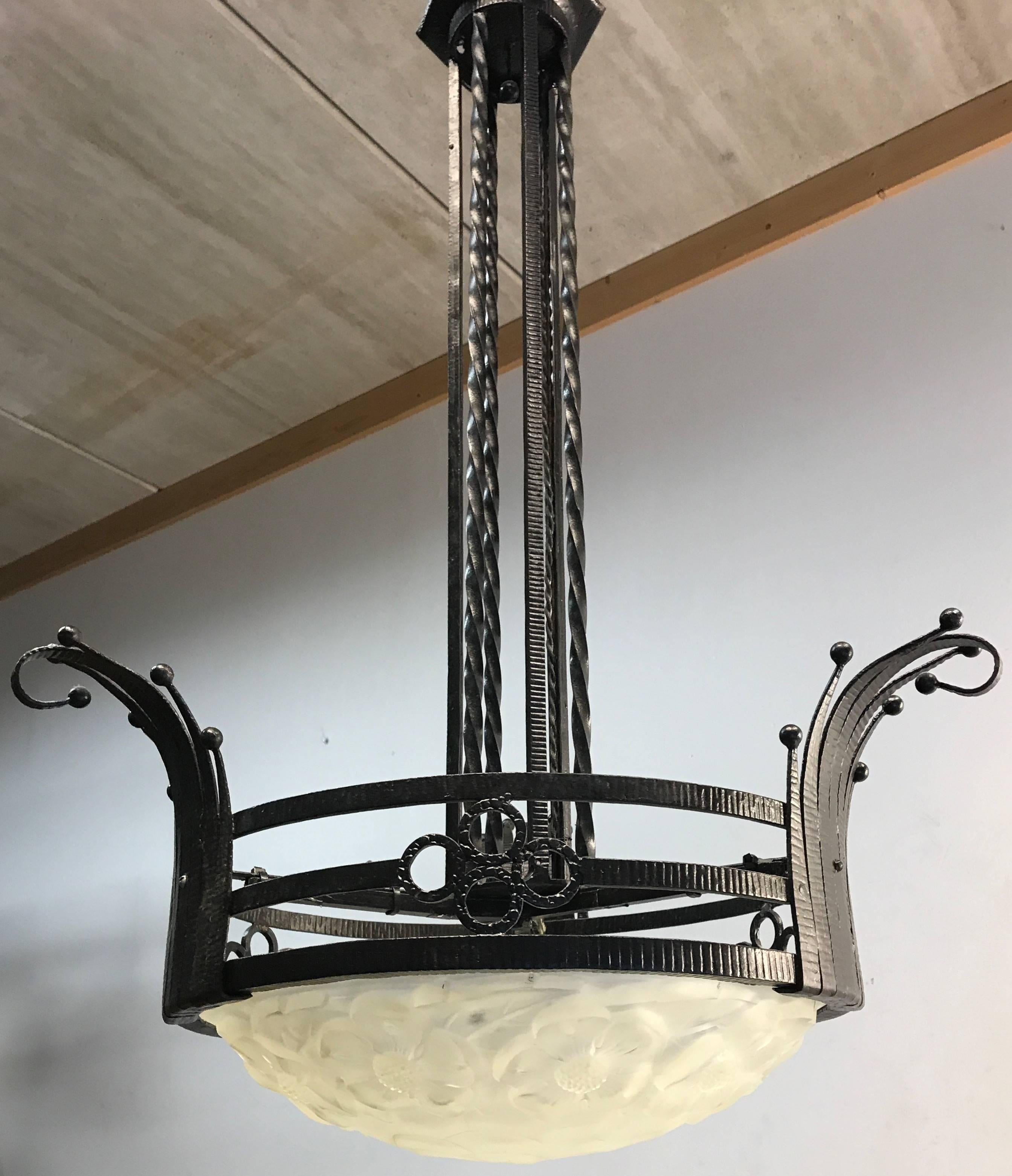 Rare and magnificent Art Deco Pendant by Degué of France.

If you have a home from the 1920s or 1930s or in the style of this period than this handcrafted work of lighting art could be perfect for you. The beautifully designed and hand-forged