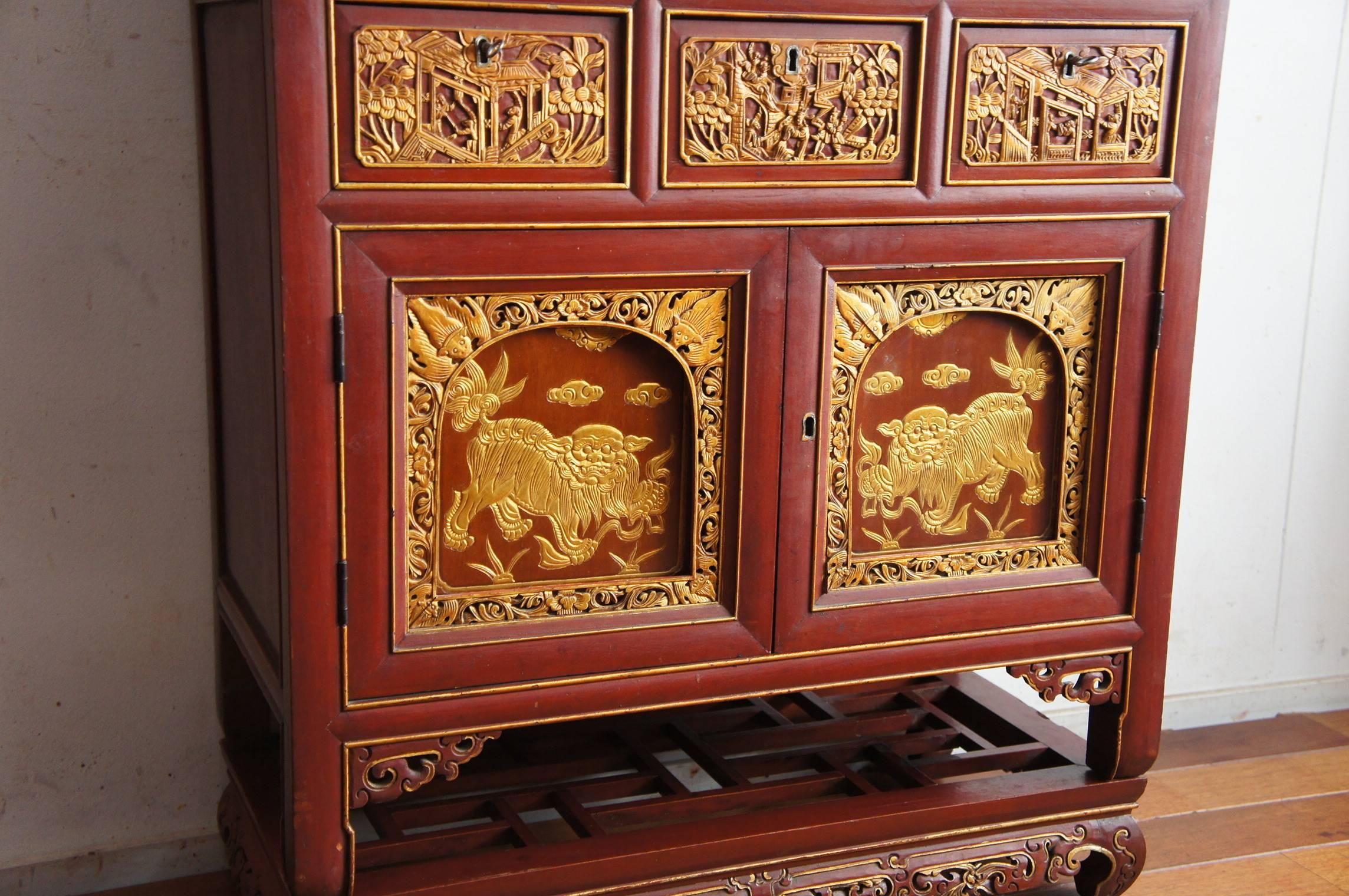 Indonesian Rare 19th Century Hand-Carved & Red Laquered Cabinet with Golden Decor Sumatra