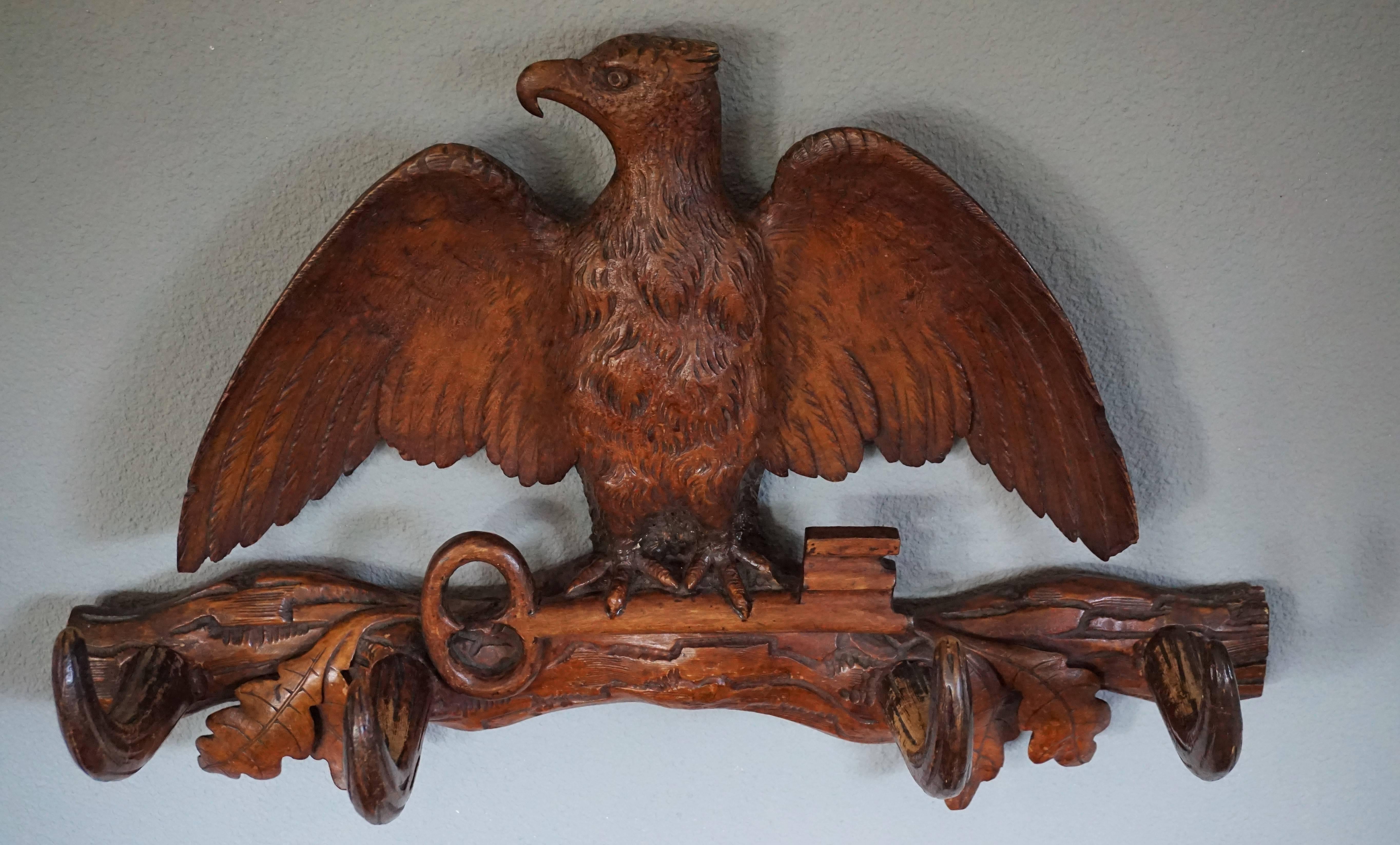 19th Century Antique Hand-Carved Small Black Forest Coat or Key Rack with Eagle Holding a Key