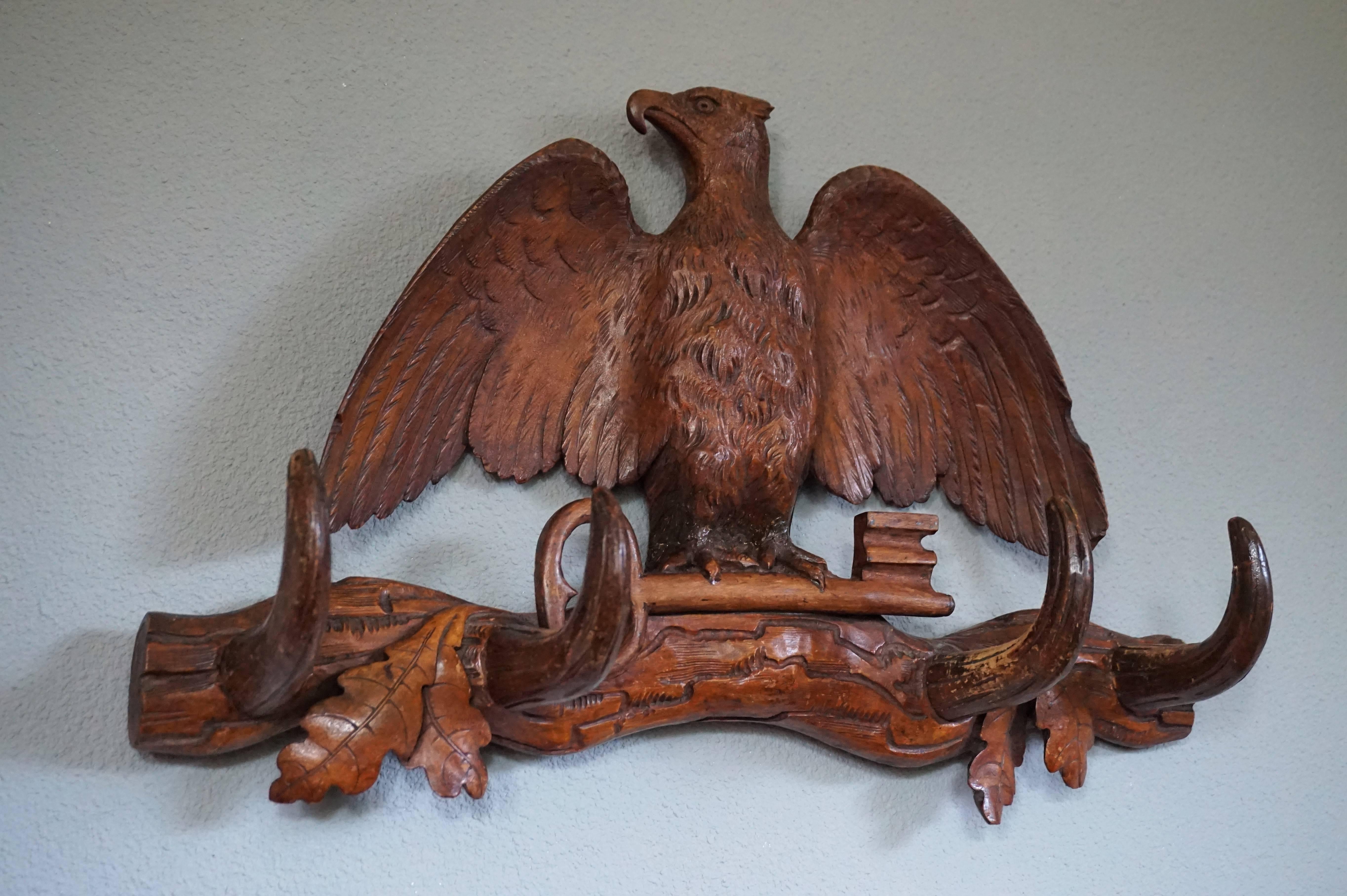 Antique Hand-Carved Small Black Forest Coat or Key Rack with Eagle Holding a Key 1